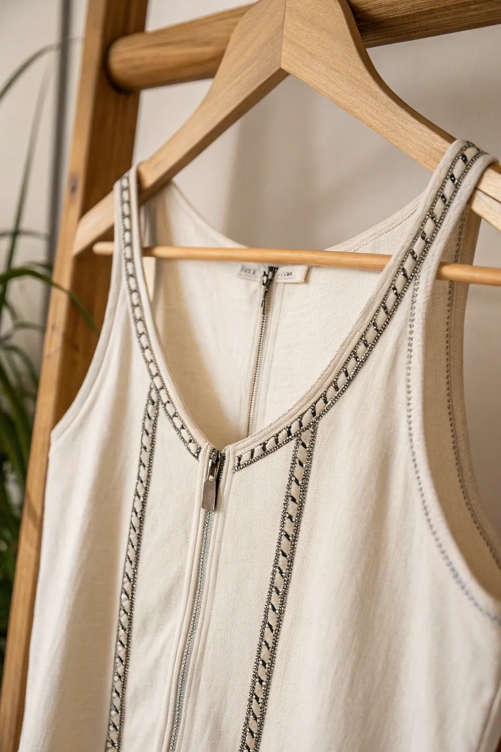 Elevate your style with zipper accents - where simplicity meets edgy elegance.
