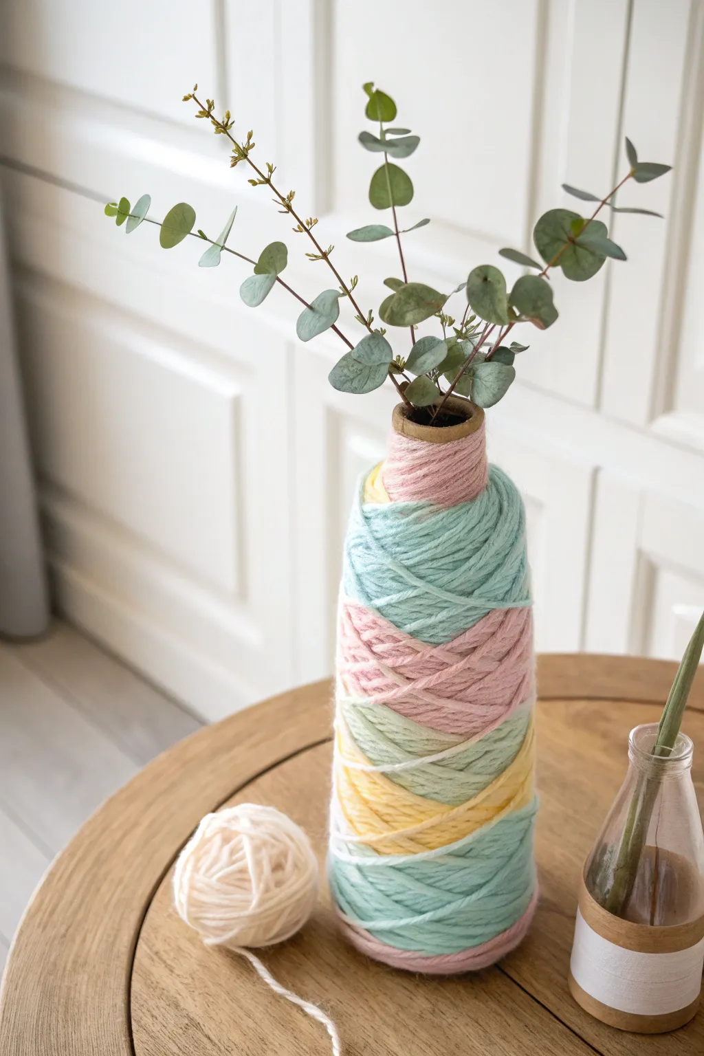 Transform your space with a touch of cozy elegance: DIY yarn-wrapped vases.
