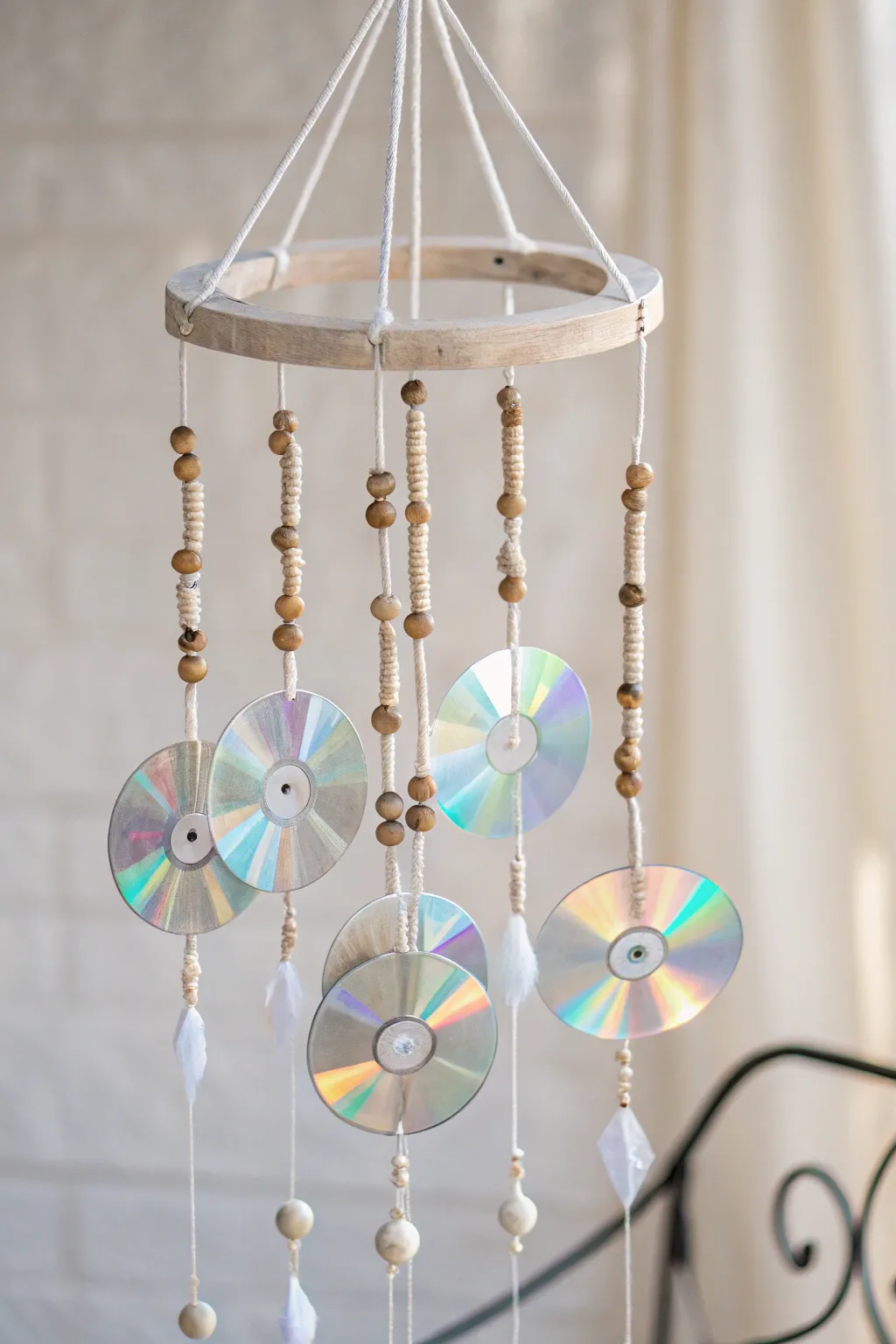 Embrace tranquility with a touch of artistry—create your own DVD wind chime for a serene patio vibe.