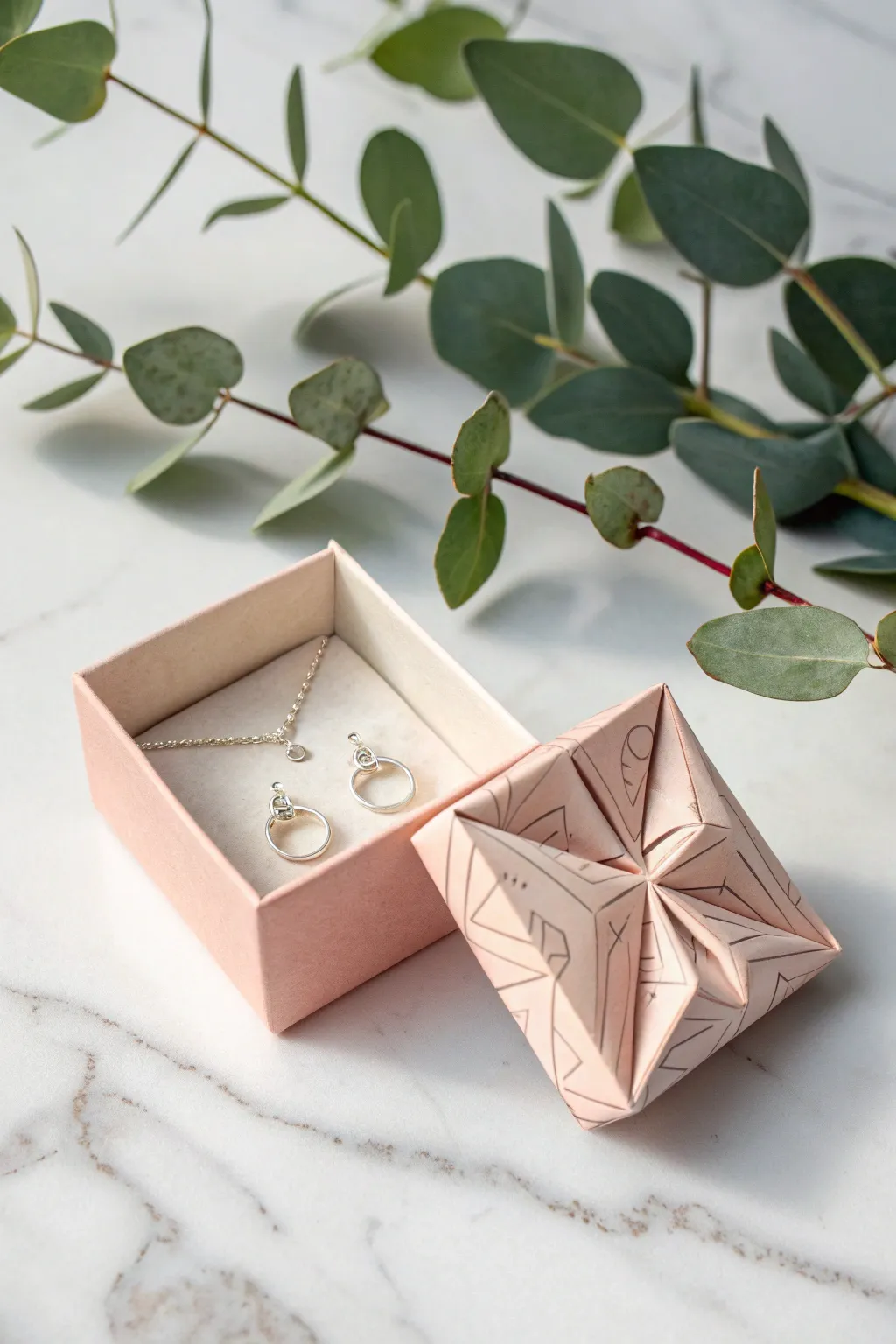 Elevate your earring presentation with the artful charm of origami packaging. 🌿✨