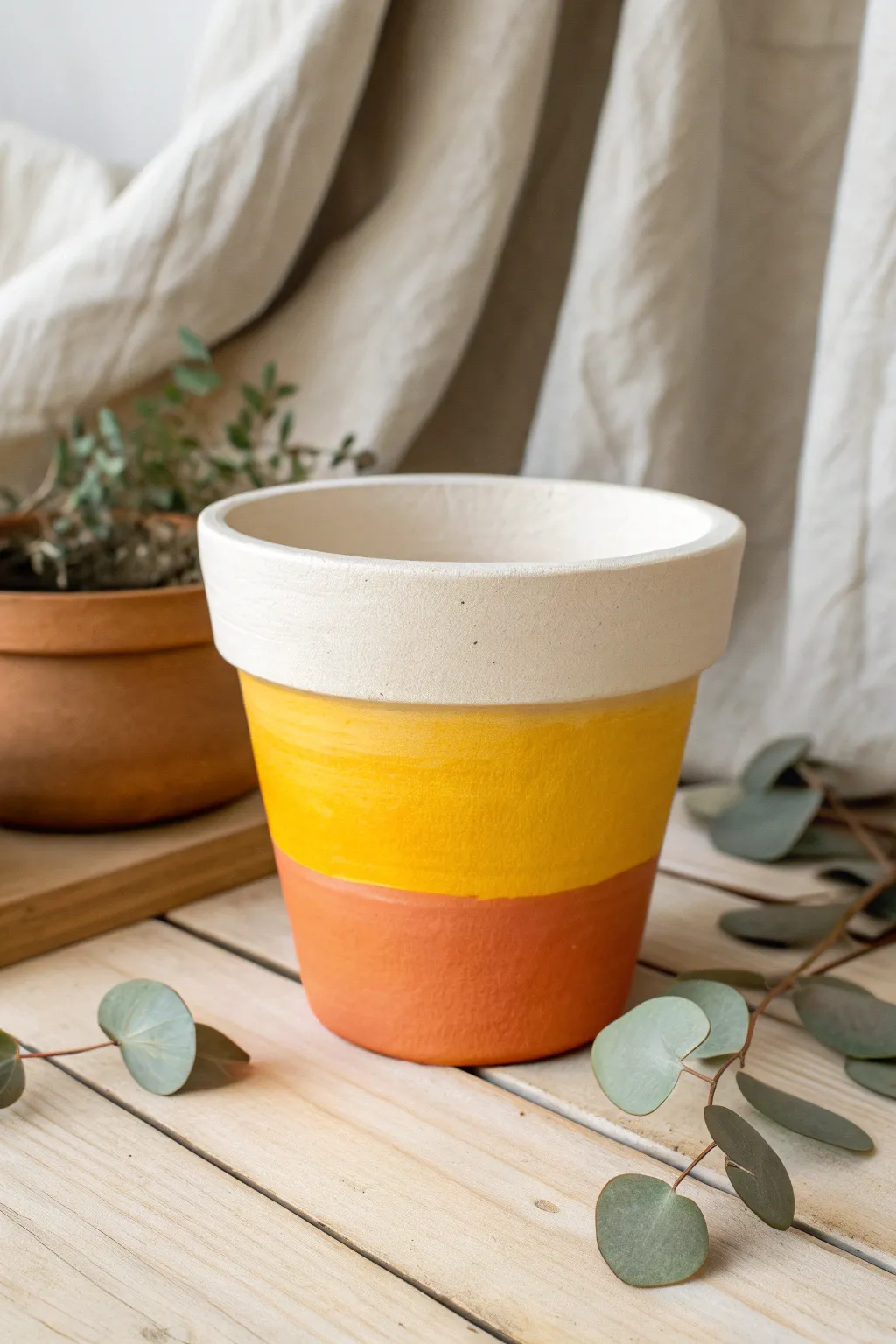Sweetly spooky: Embrace Halloween with this charming candy corn planter.