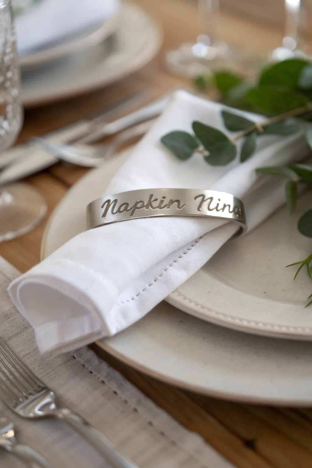 Add a personal touch to your dinner table with custom-stamped metal napkin rings.