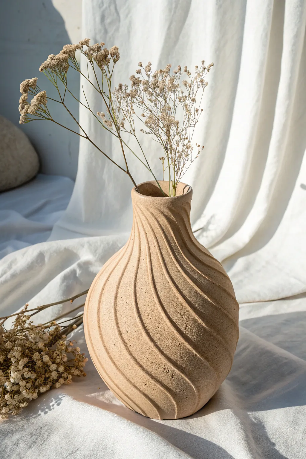 Embrace simplicity with an abstract clay vessel that transforms any space with its artistic elegance.