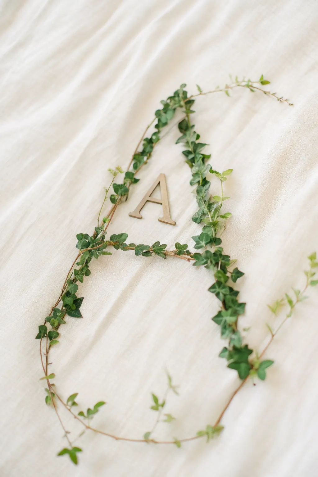 Embrace nature's elegance with leafy monogram art.