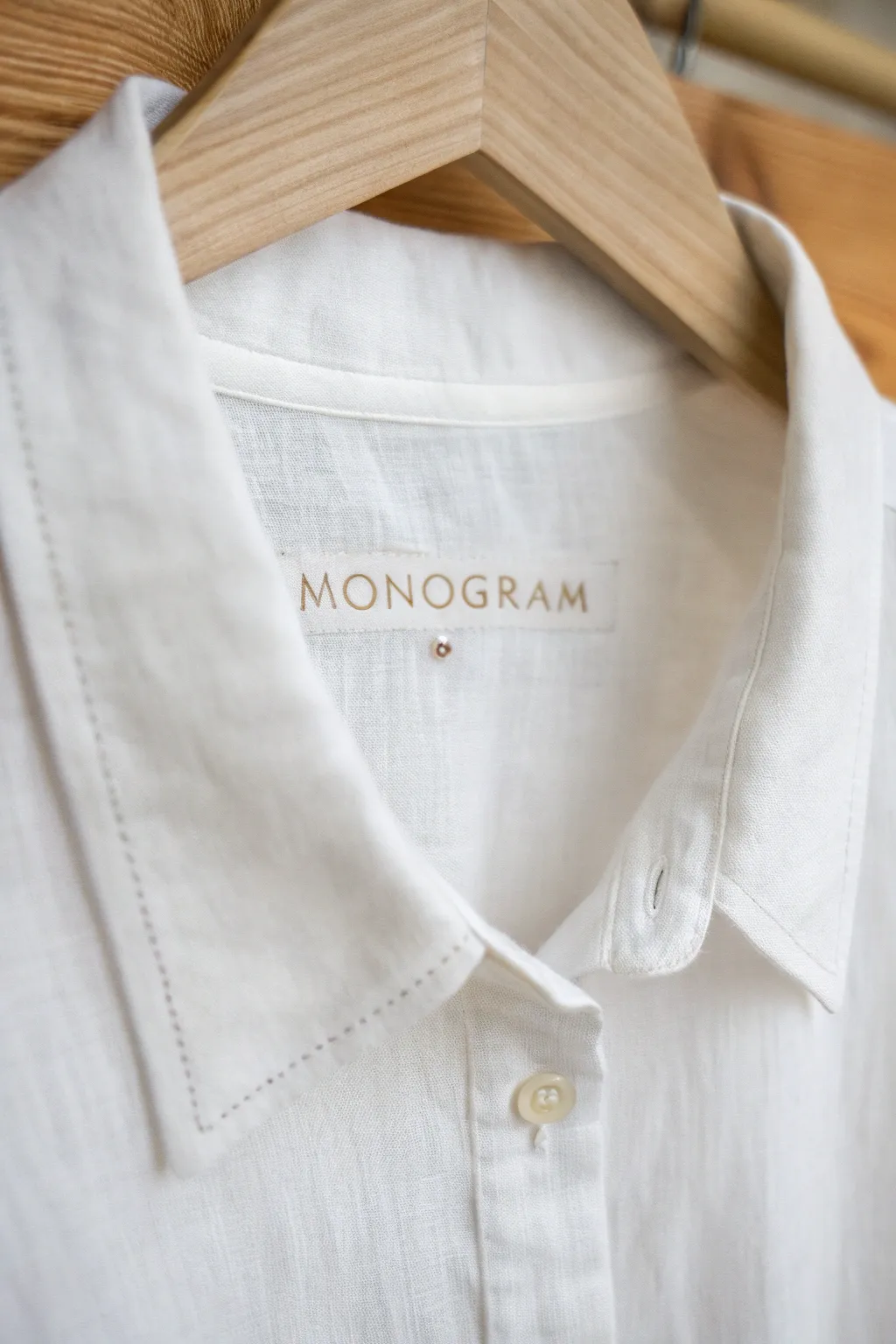 Discover the elegance of subtlety with a minimalist monogram inside the collar. Perfect for those who appreciate refined personal touches.