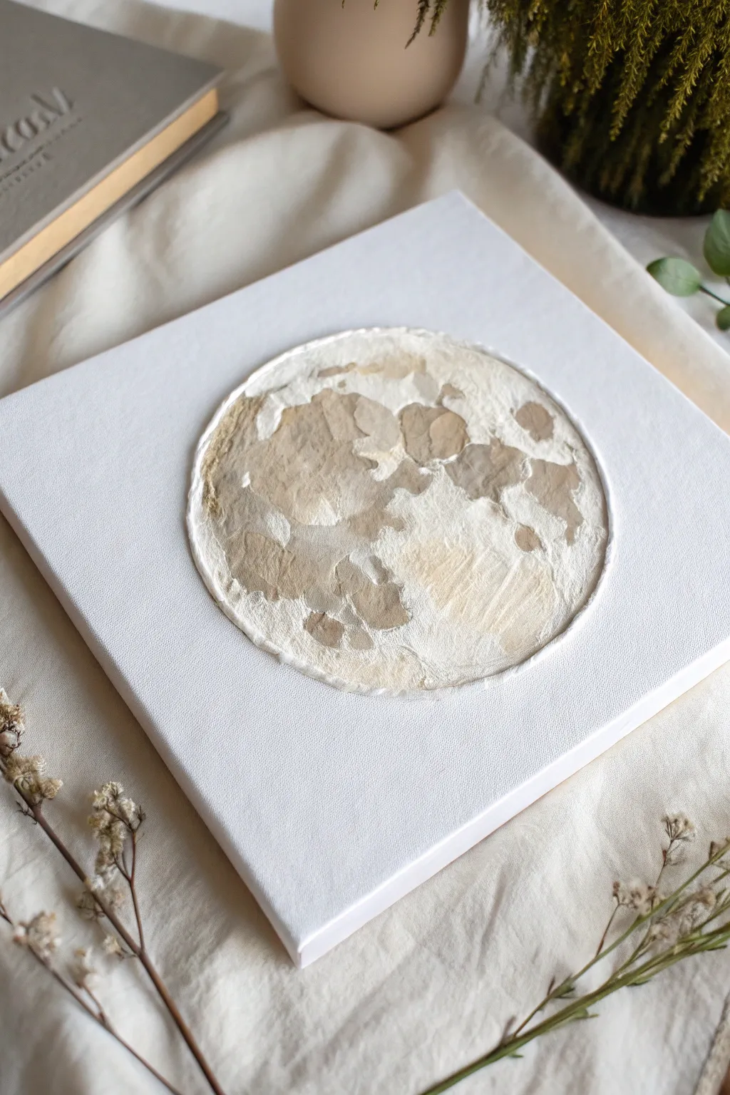 Discover the beauty of mixed media art with this minimalist moon painting, where textures meet elegance.