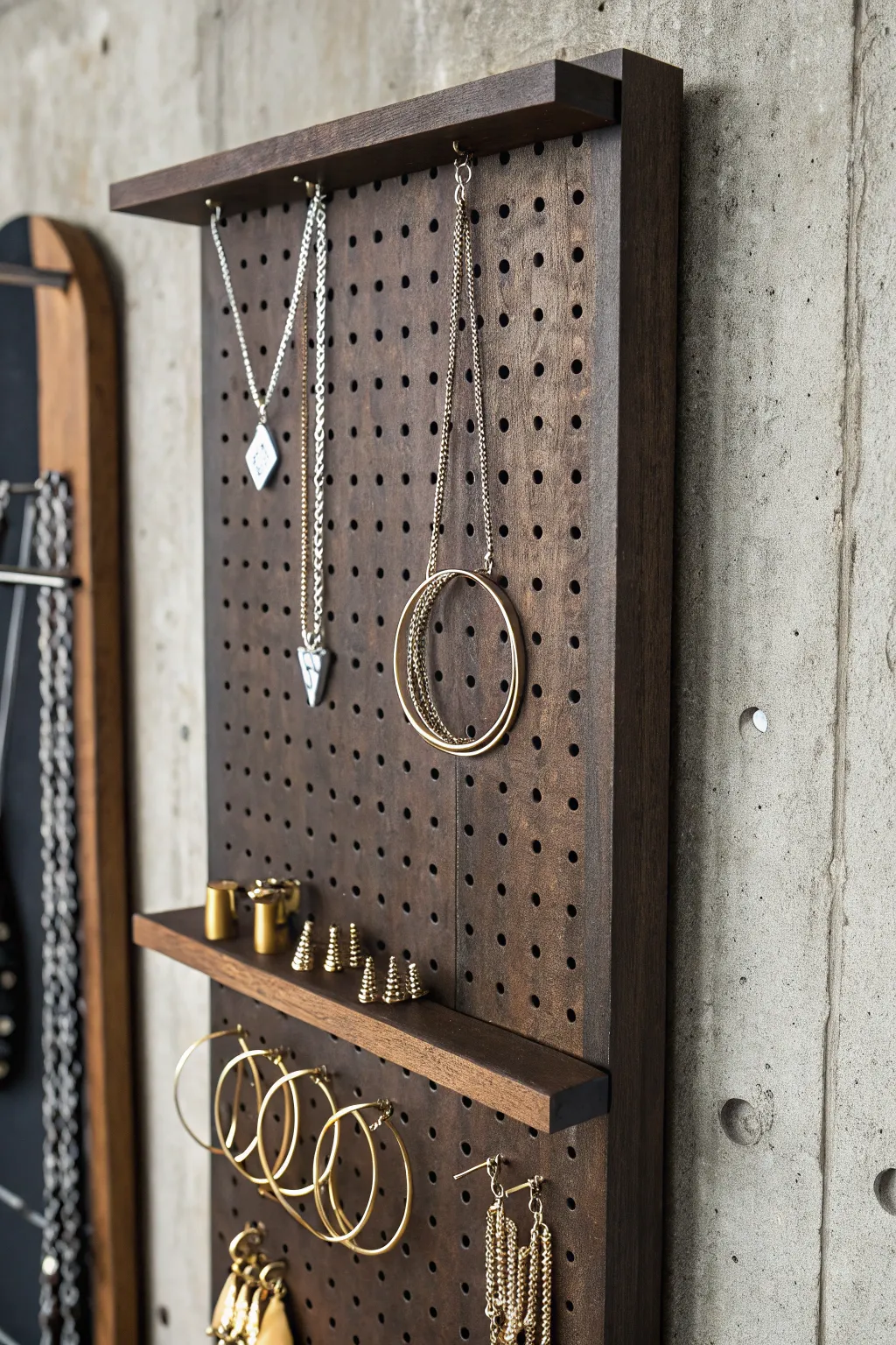 Elevate your space with a handcrafted pegboard jewelry display—minimalist design meets bold elegance.