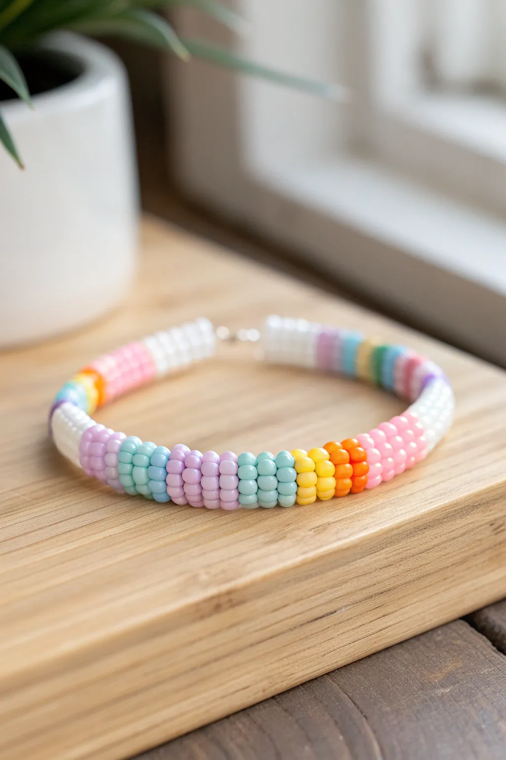 Add a splash of color to your style with this charming rainbow wave bracelet, embodying minimalistic elegance.