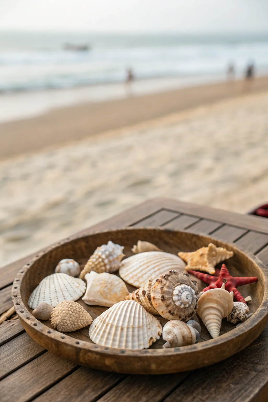 A thali with decorative sea shells for a natural, coastal theme.