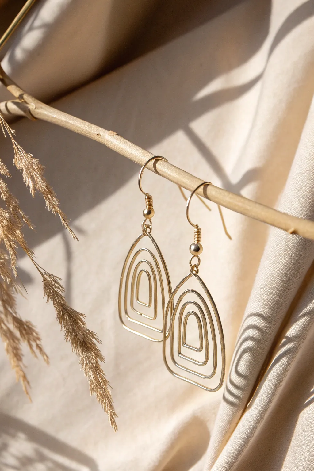 Unveil the artistry in simplicity with these abstract wire earrings.