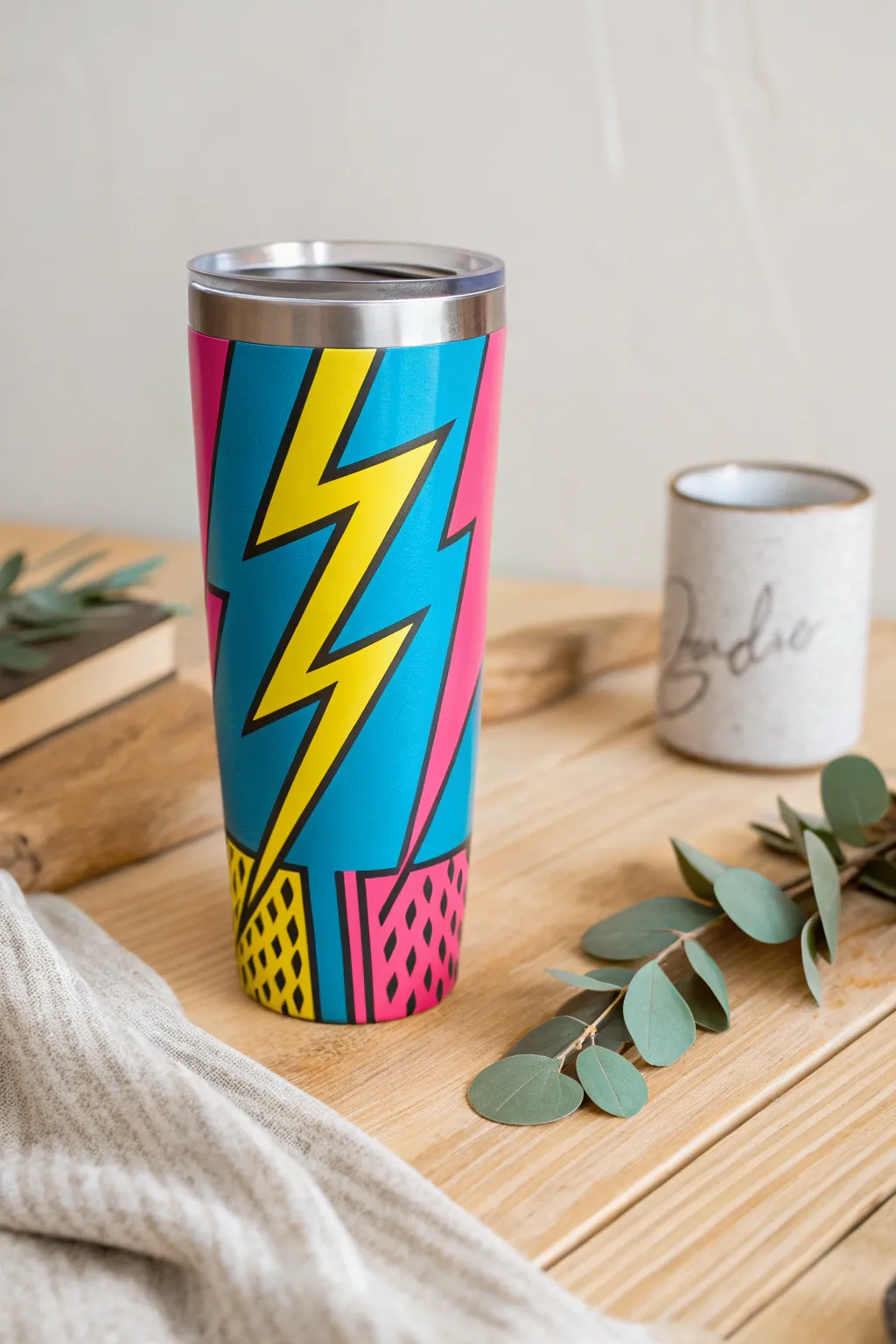 Add a splash of pop art fun to your day with this vibrant tumbler, perfect for those who love a blend of minimalism and bold expression.