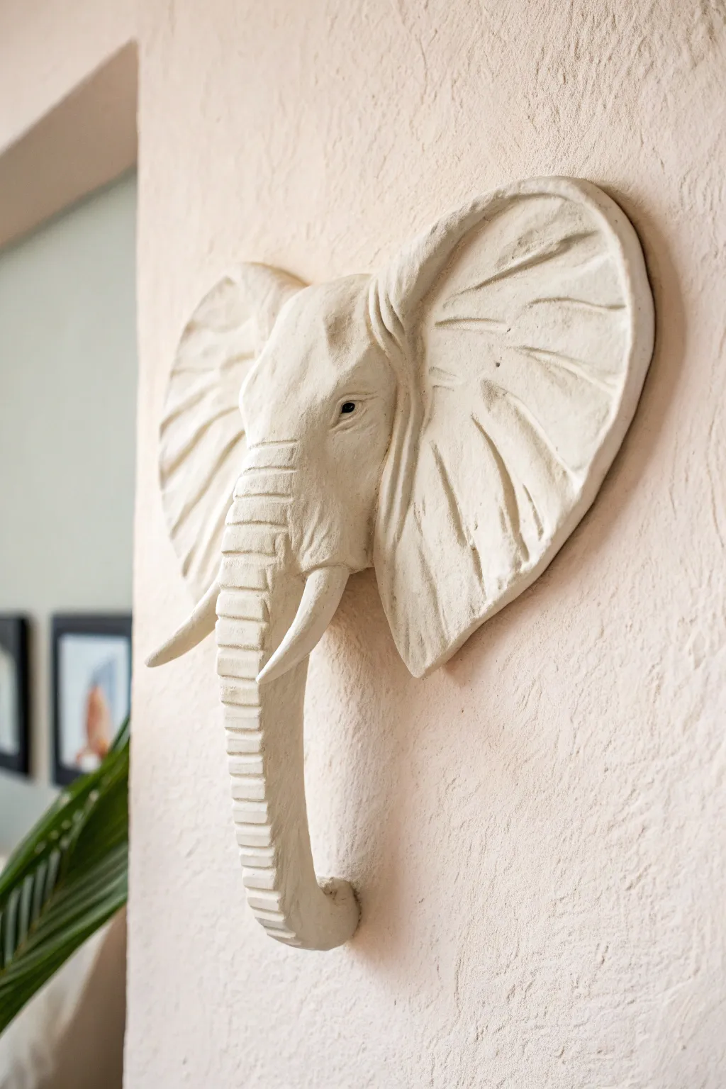 March of Elegance: Handcrafted clay elephant silhouette adds a whimsical touch to minimalist decor.