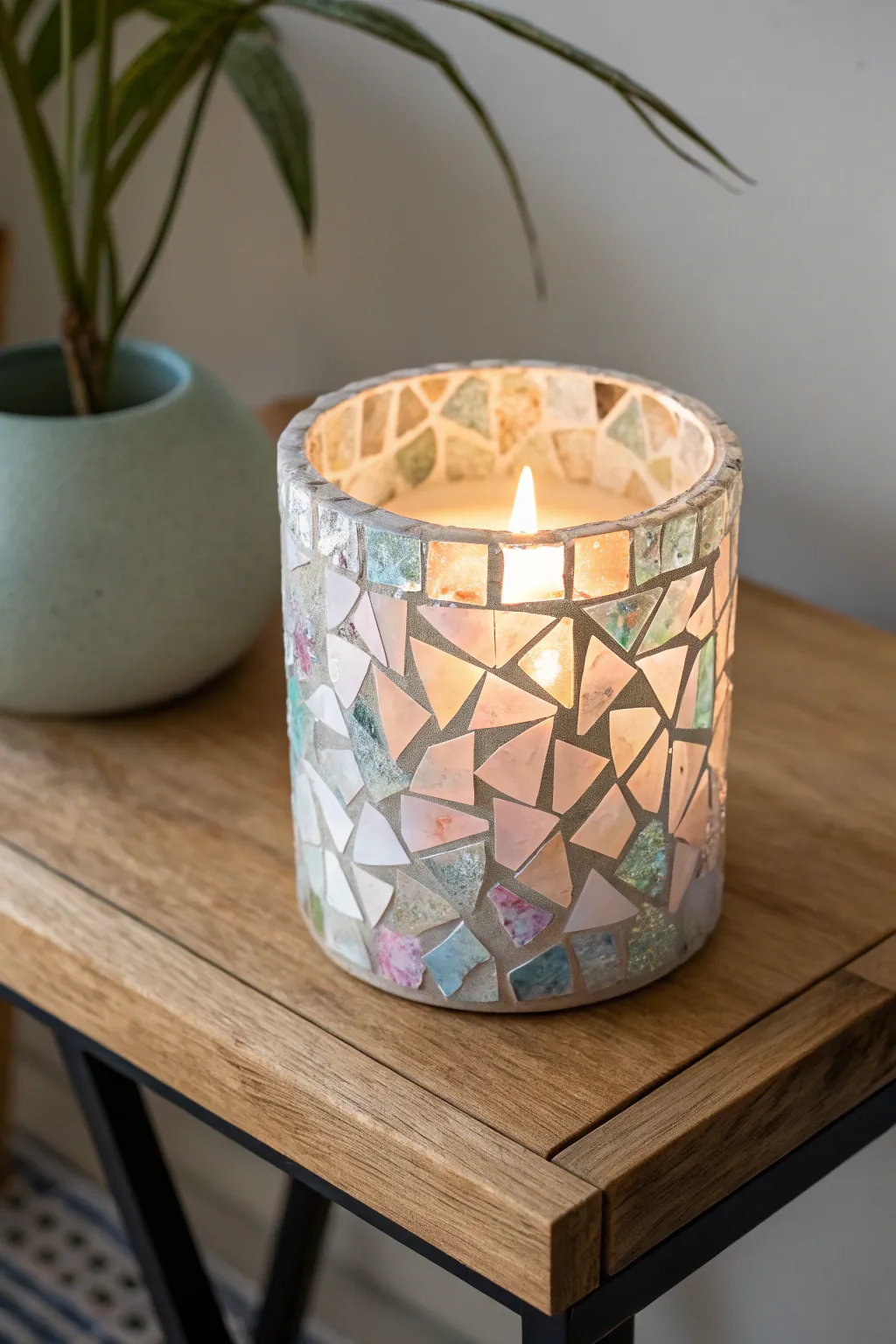 Illuminate your space with a touch of artistry: a mosaic glass candle holder that dances with light.