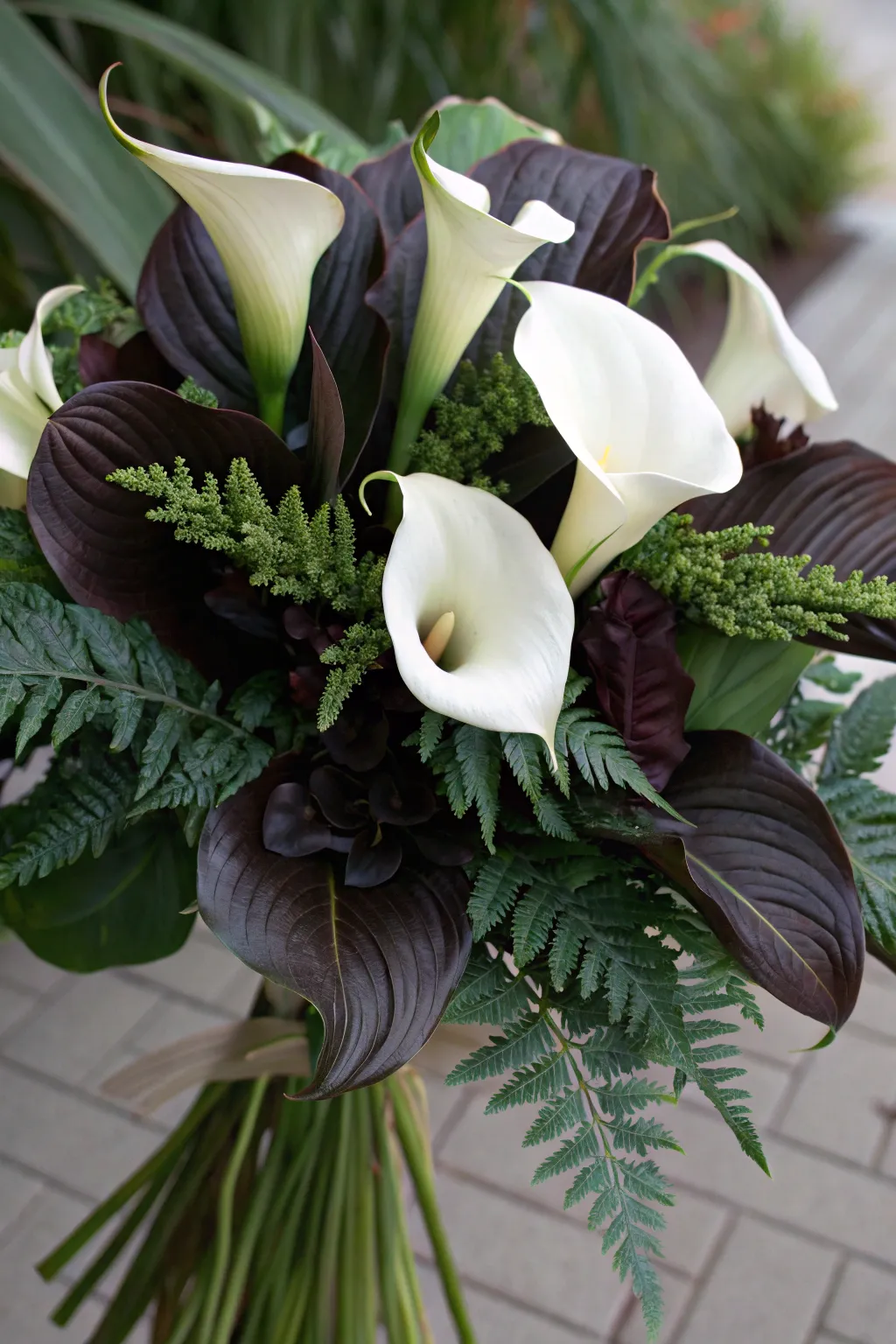 Bold contrast with a modern calla lily bouquet.