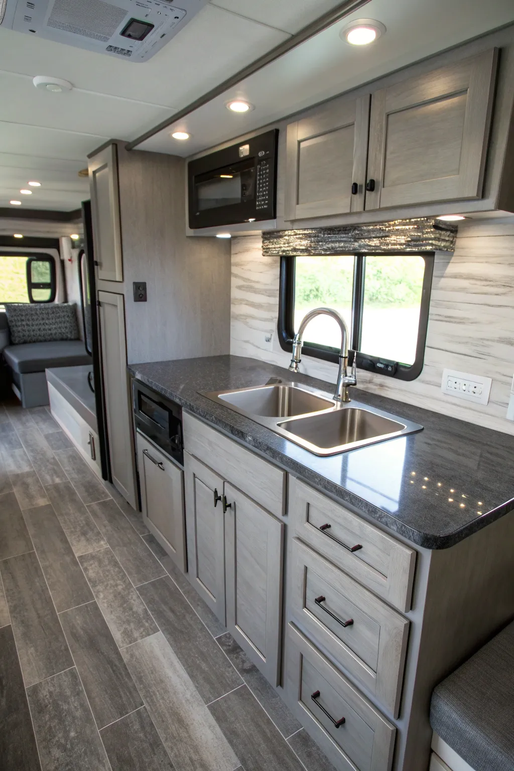 Transform your RV with a chic monochrome grey palette for a unified and stylish interior.