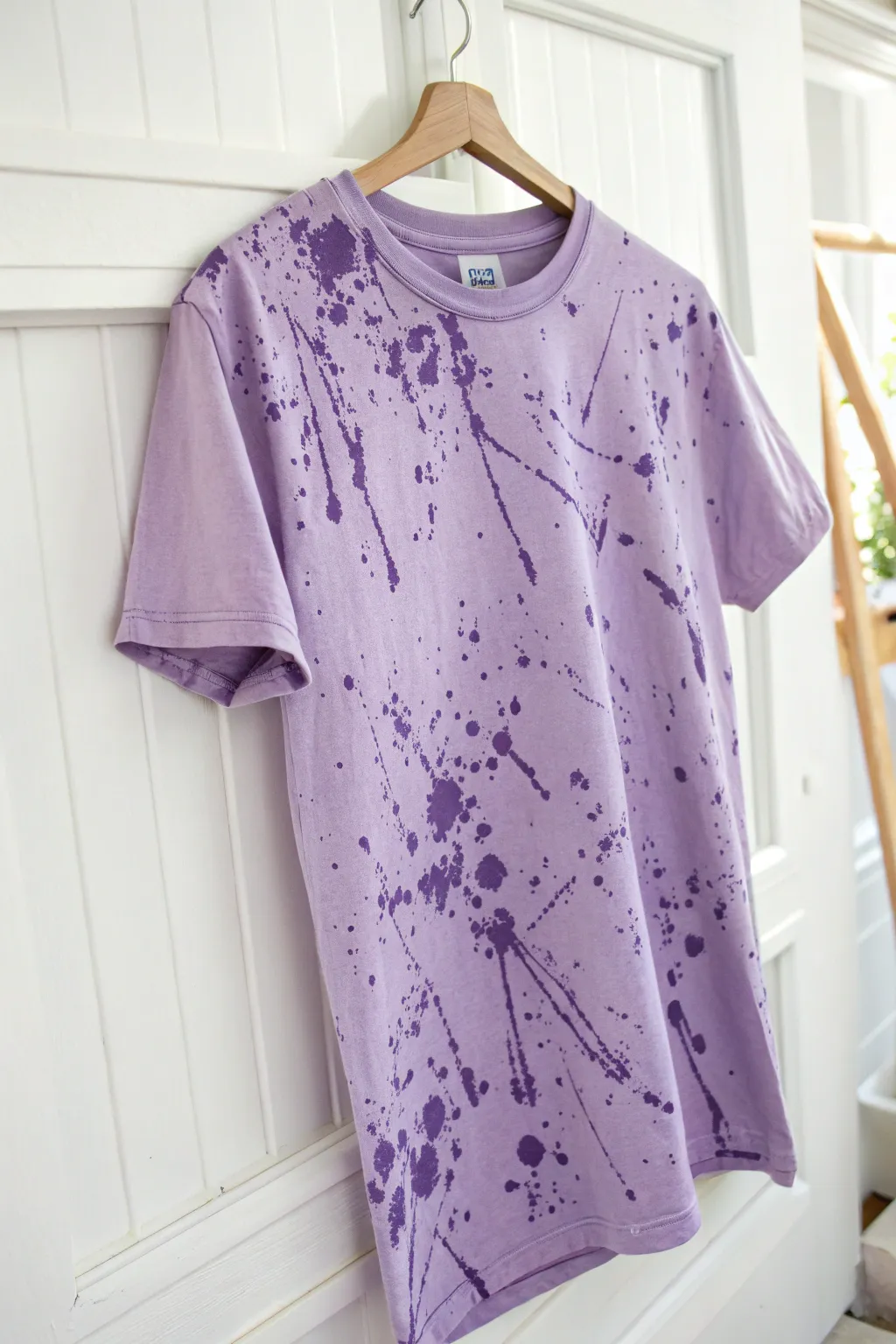 Embrace your artistic flair with this captivating splatter paint t-shirt—where simplicity meets creativity!