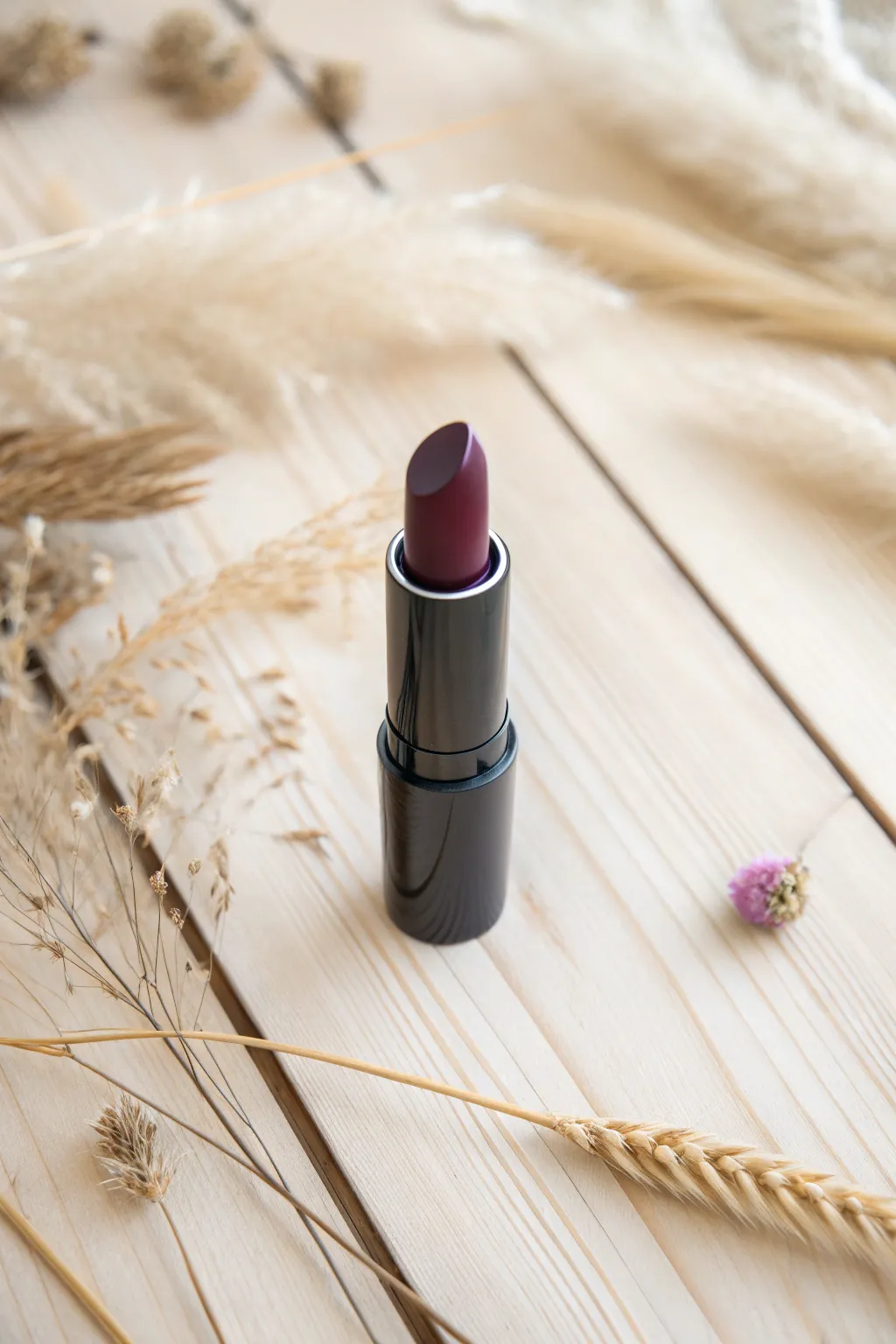 Embrace bold beauty with a touch of nature. 💄🌾 #DarkLipDrama #MinimalistElegance