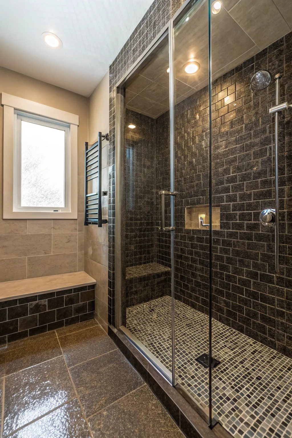 A luxurious shower experience with textured dark tiles.