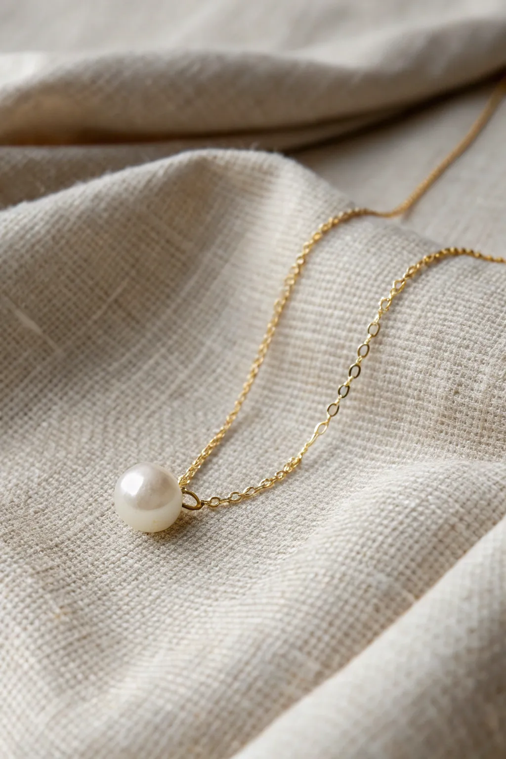 Embrace elegance with a minimalist pearl necklace - a blend of simplicity and timeless charm.