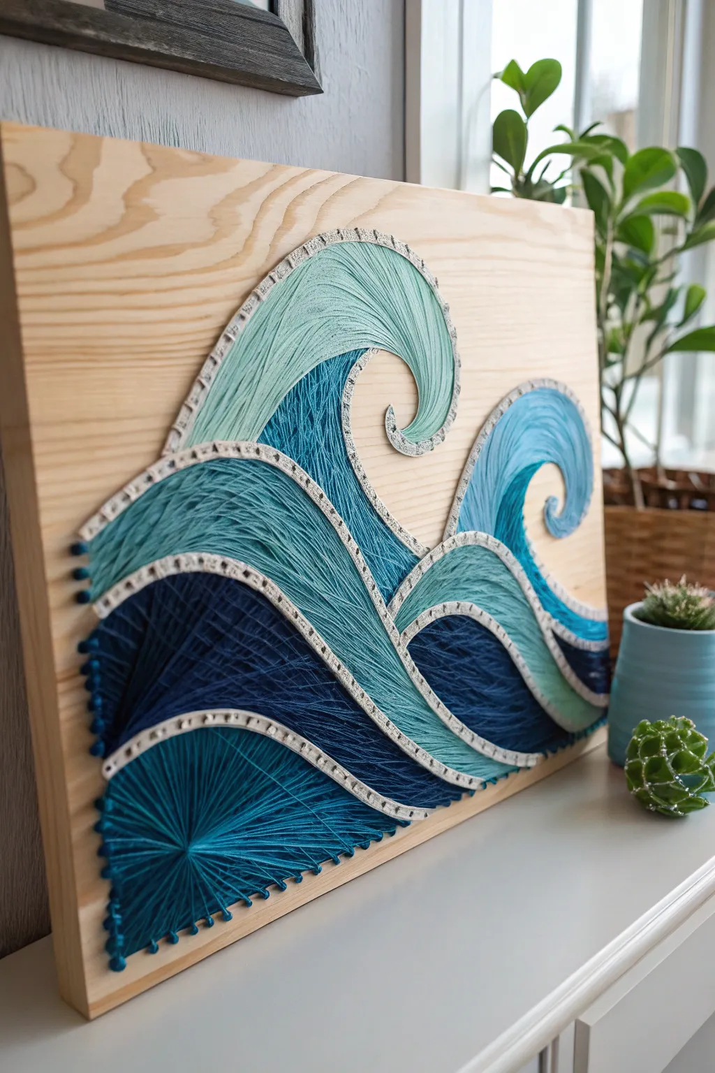Capture the essence of the ocean with this serene wave-inspired string art, perfect for adding a touch of coastal calm to your minimalist haven.