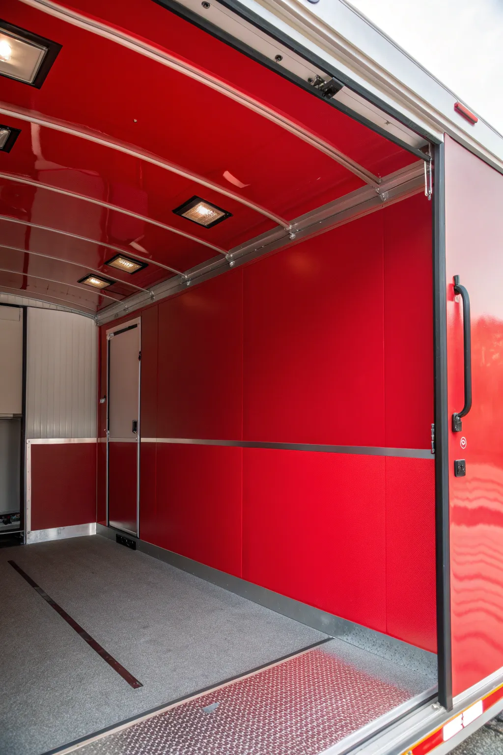 Make a bold statement with a vibrant red wall in your trailer, exuding confidence and style.