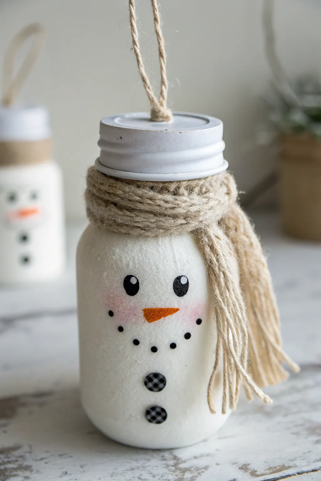 Transform your mason jar into a delightful snowman ornament; perfect for adding a touch of handcrafted charm to your home decor.