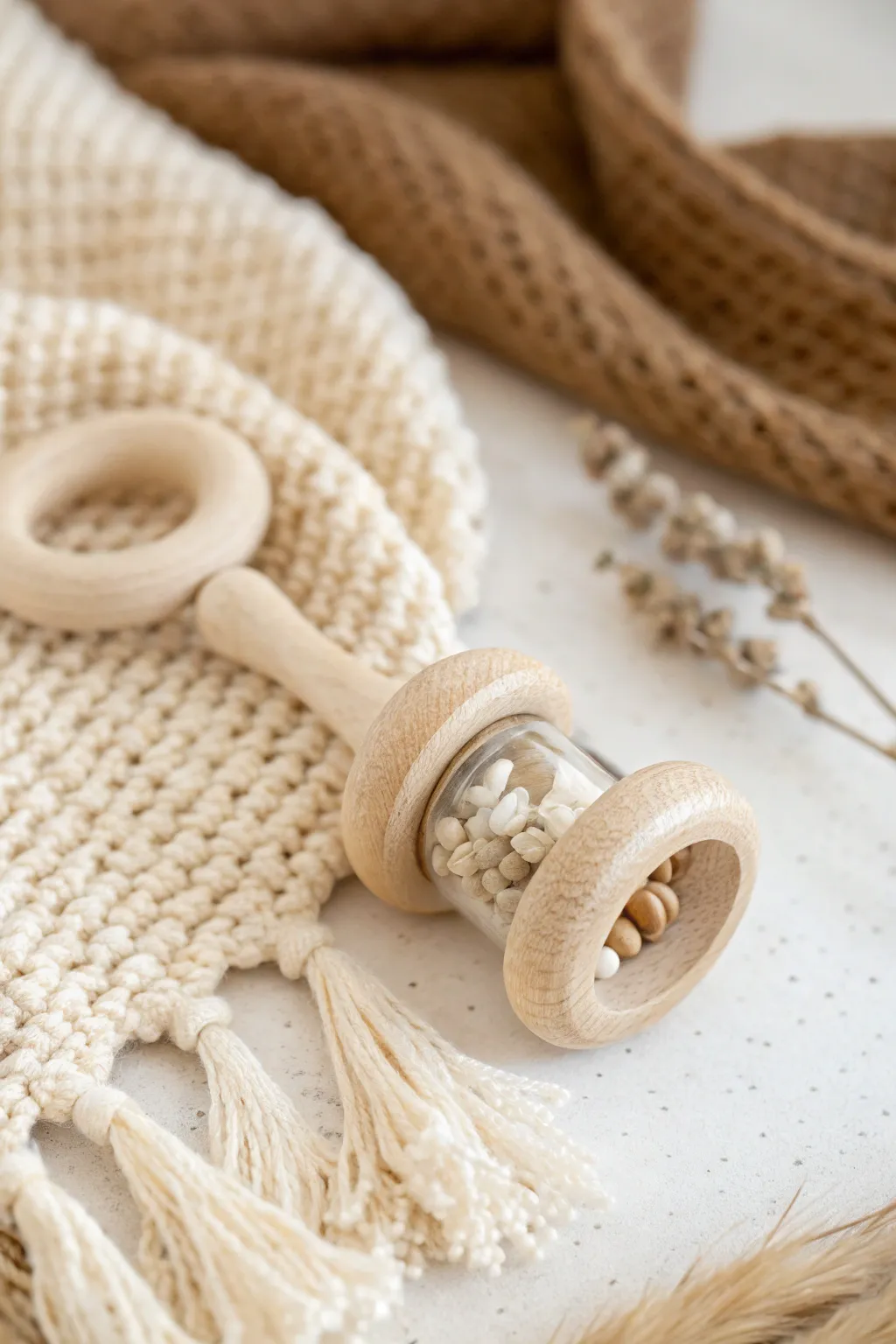 Crafted with love: A minimalist wooden baby rattle that delights with every shake.
