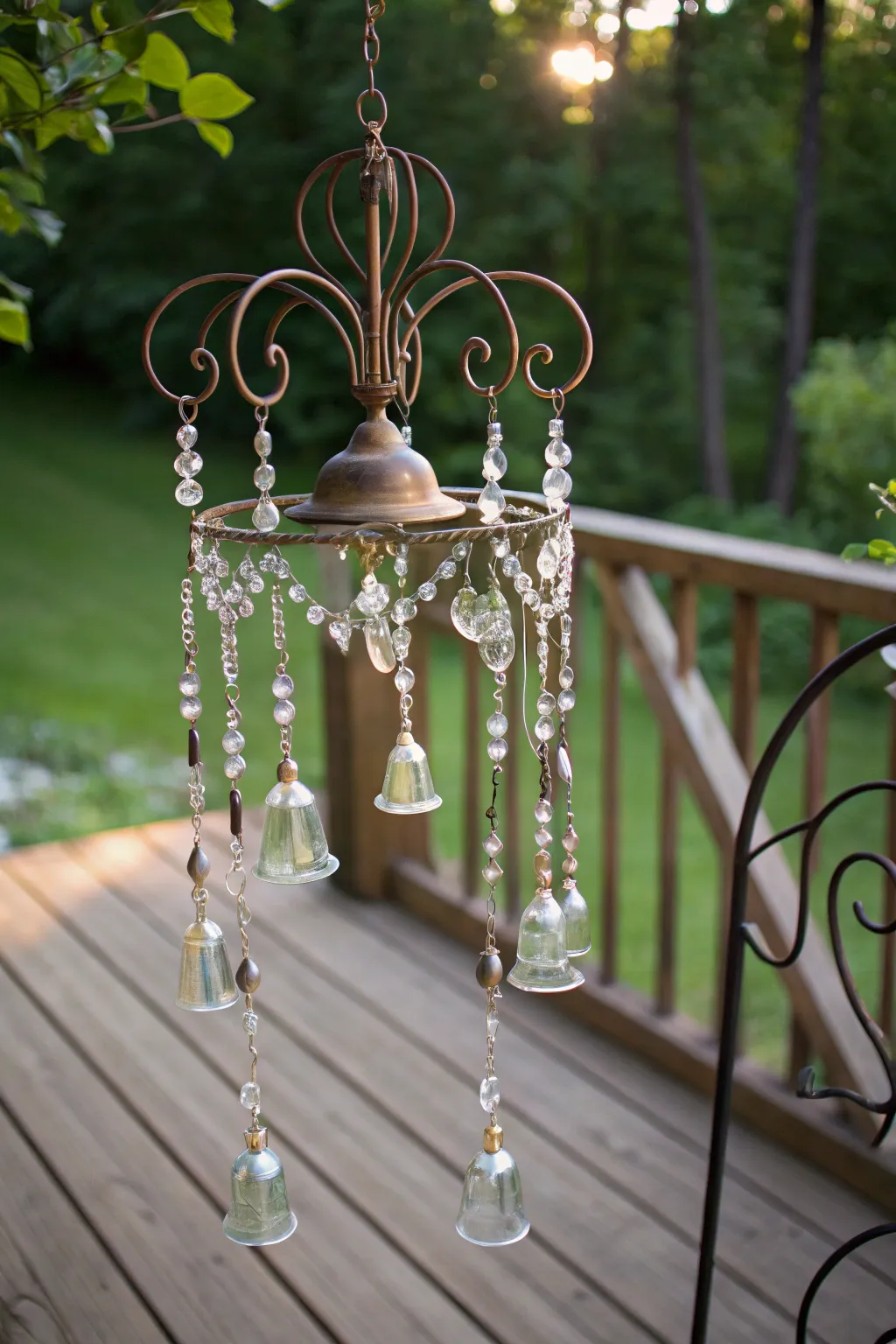 Embrace tranquility with a repurposed chandelier wind chime, bringing melodic charm to your garden sanctuary.