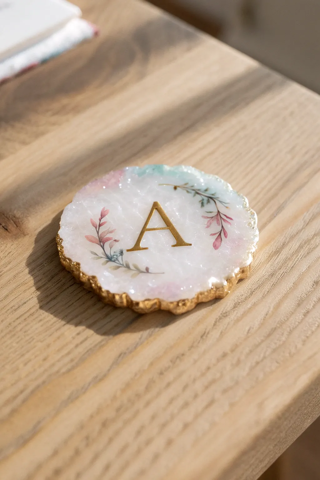 Elevate your table setting with personalized elegance: stunning monogrammed resin coasters capturing Scandinavian simplicity with a boho twist.