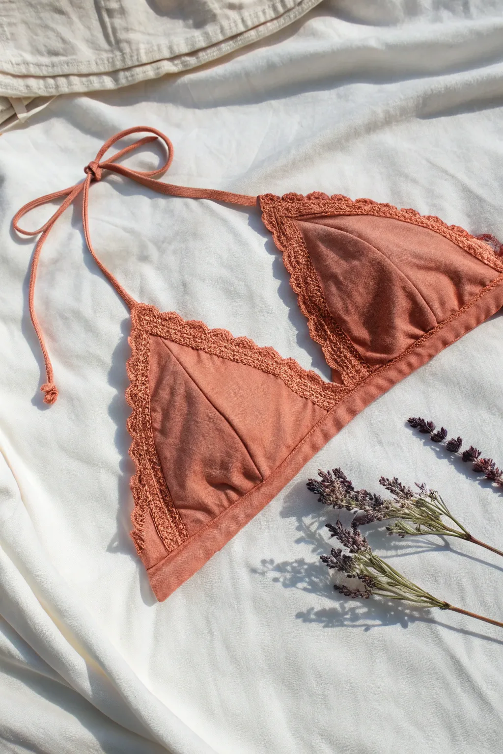 Embrace the art of sewing with this charming boho-inspired bikini top, perfect for sunny beach days and crafted with love.