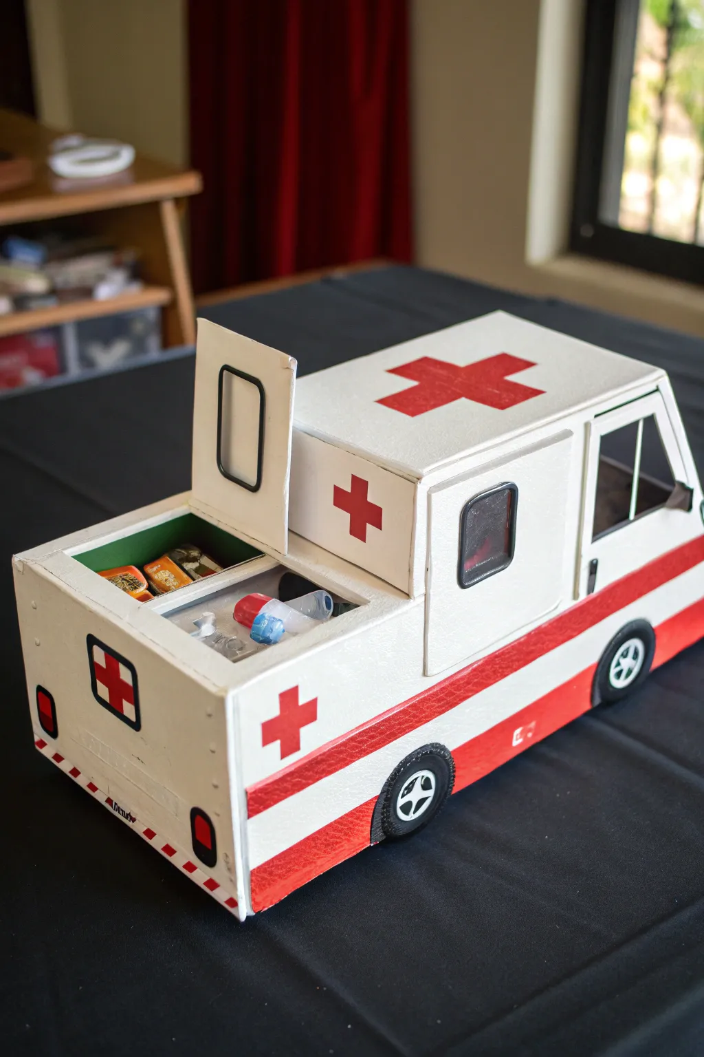 Transform your shoe box into a striking ambulance car for a creative twist on toy crafting.
