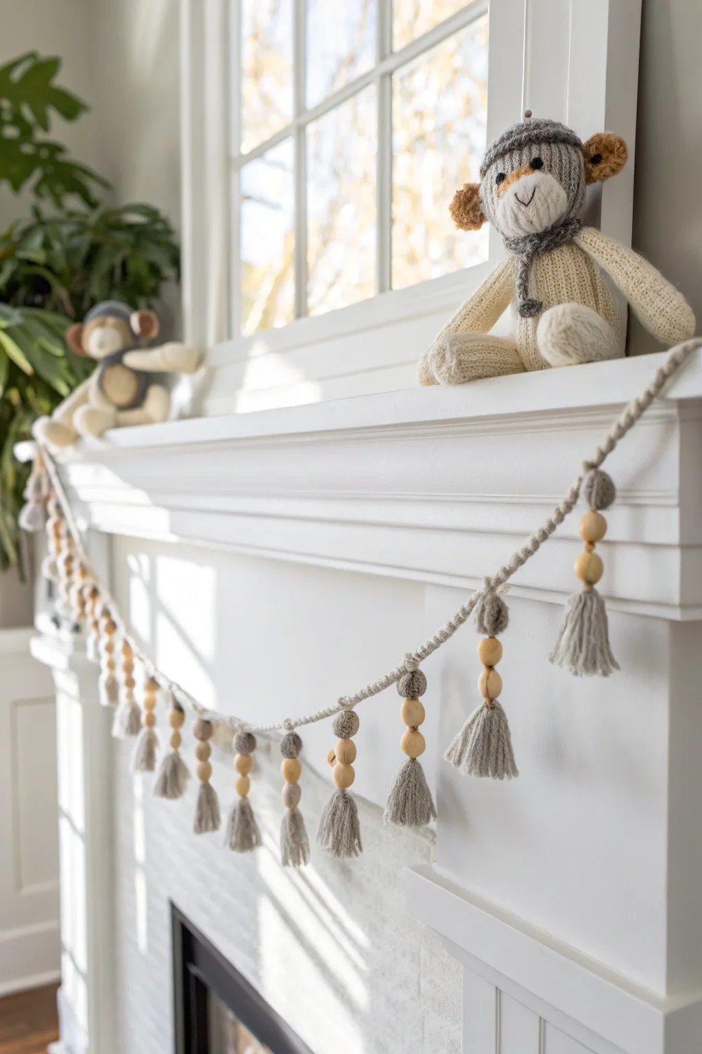 Add a whimsical touch to your decor with this charming sock monkey garland, perfect for a minimalist home.