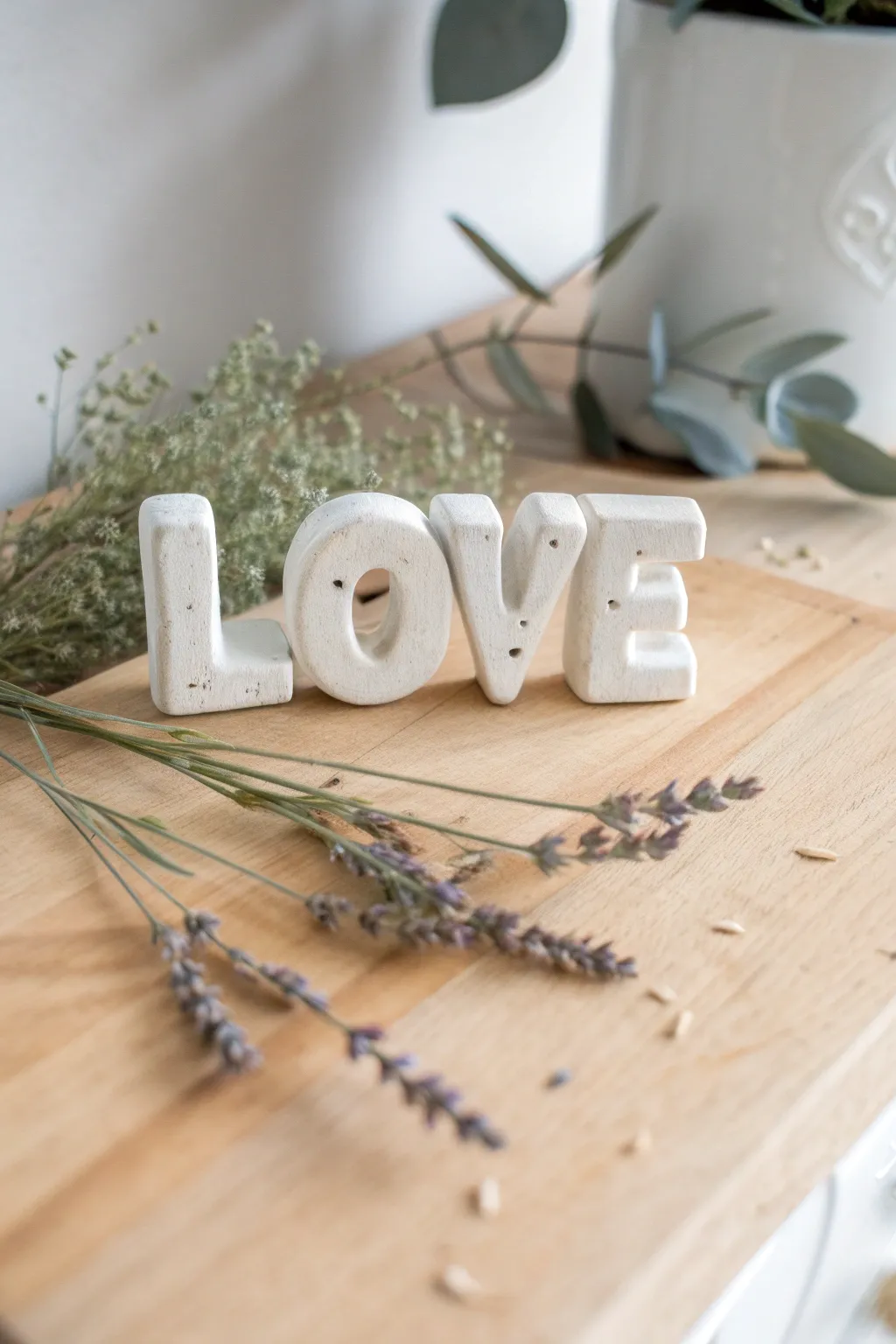 Craft your own message of love with these charming clay letters. Perfect for adding a touch of minimalist romance to any space.