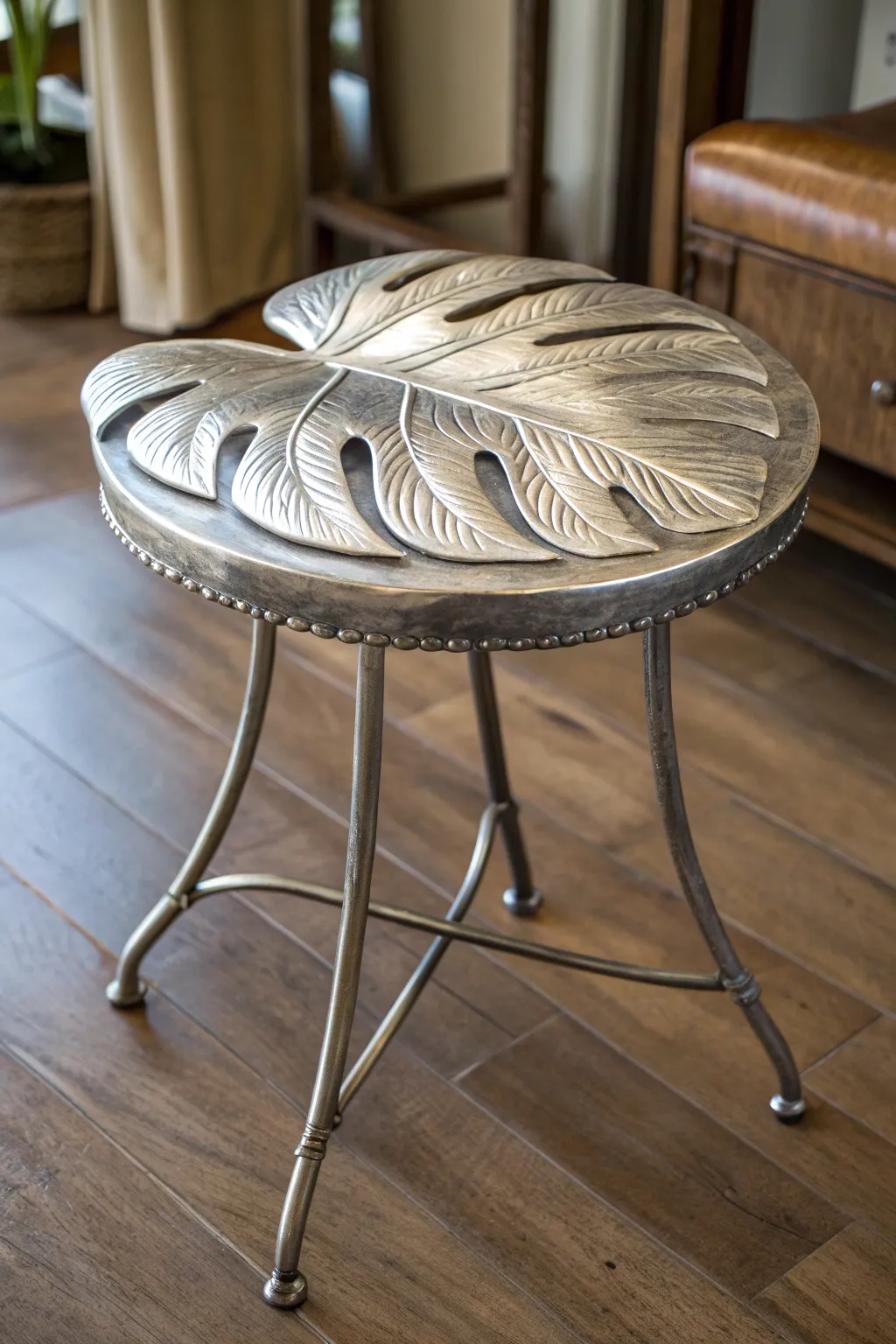 Elevate your space with this stunning nature-inspired stool, where metal meets organic elegance.