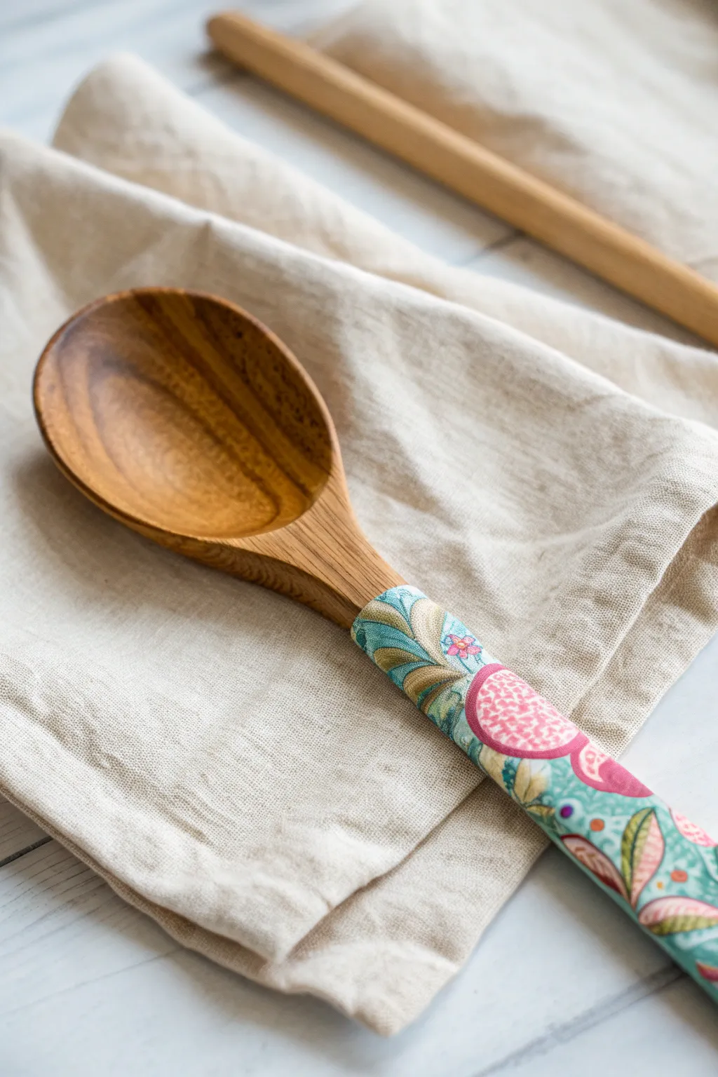 Add a cozy, colorful touch to your kitchen with DIY fabric-wrapped wooden spoons!