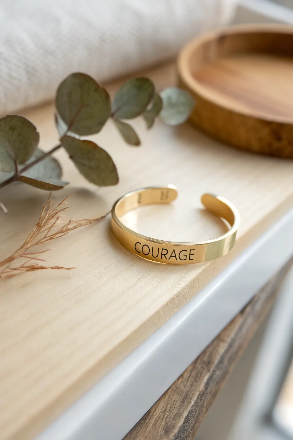 Wear your bravery with grace – let 'COURAGE' adorn your wrist as a reminder to embrace fearless journeys.