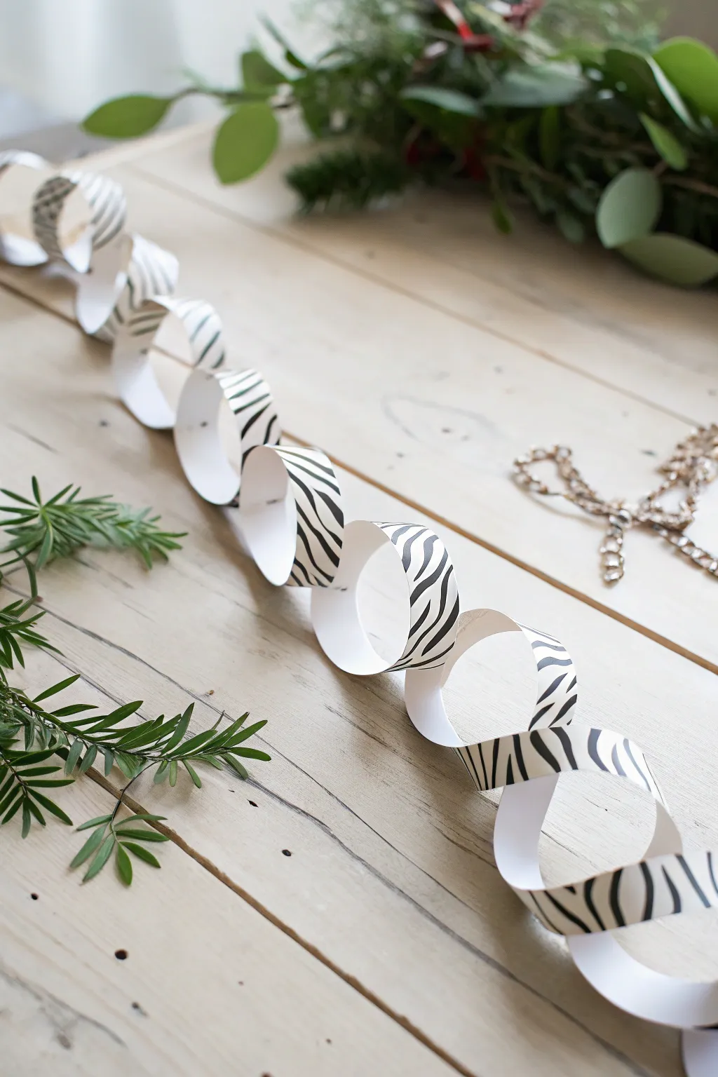 Embrace simplicity and creativity with a charming zebra paper chain, perfect for adding a playful touch to any room.
