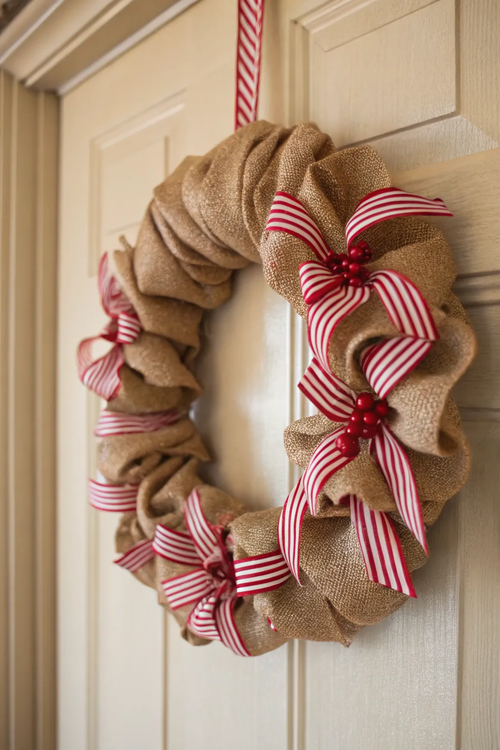 Embrace the festive spirit with a Peppermint Twist on your door. 🎄✨