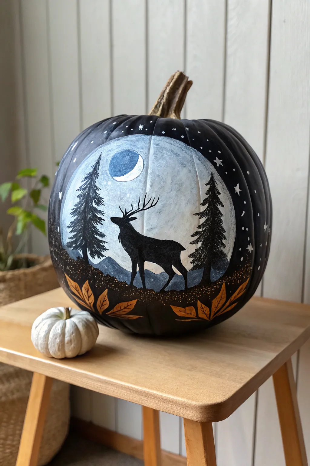 Embrace autumn with this enchanting deer and moonlit sky pumpkin painting, a perfect blend of minimalist elegance and boho charm.