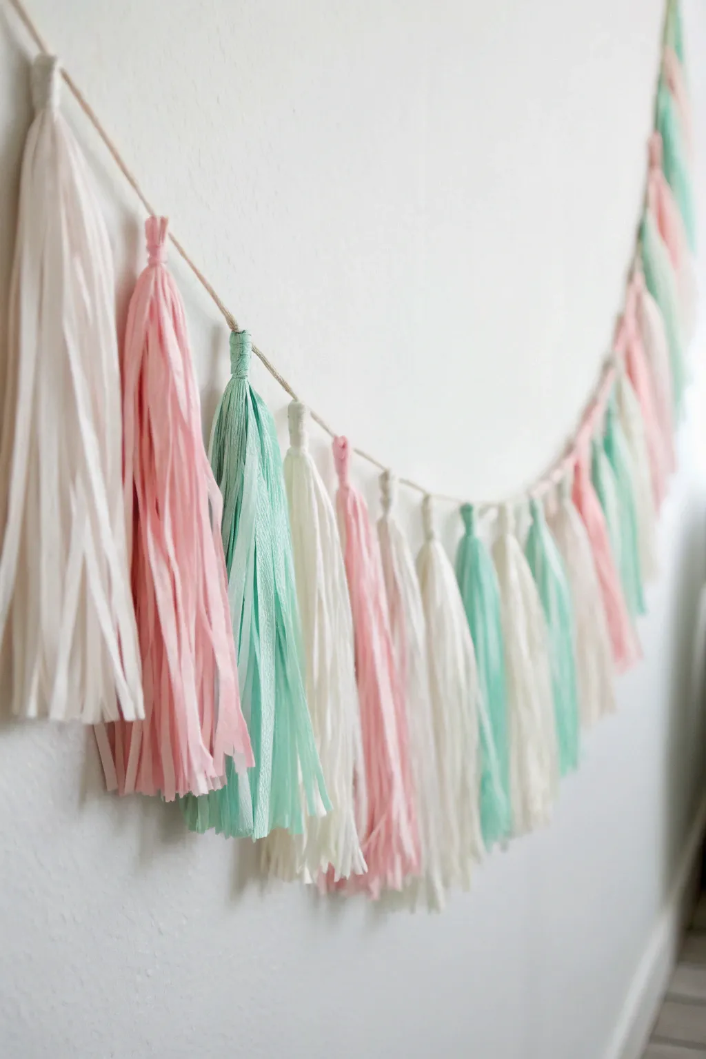 Add a touch of whimsy to your celebrations with this elegant DIY tassel garland.