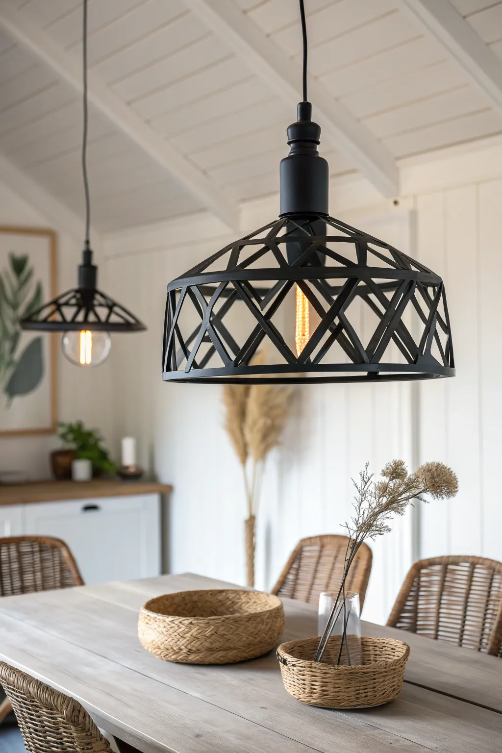 Elevate your dining space with a bold light fixture that blends minimalist elegance with a touch of Boho charm. 🌿✨