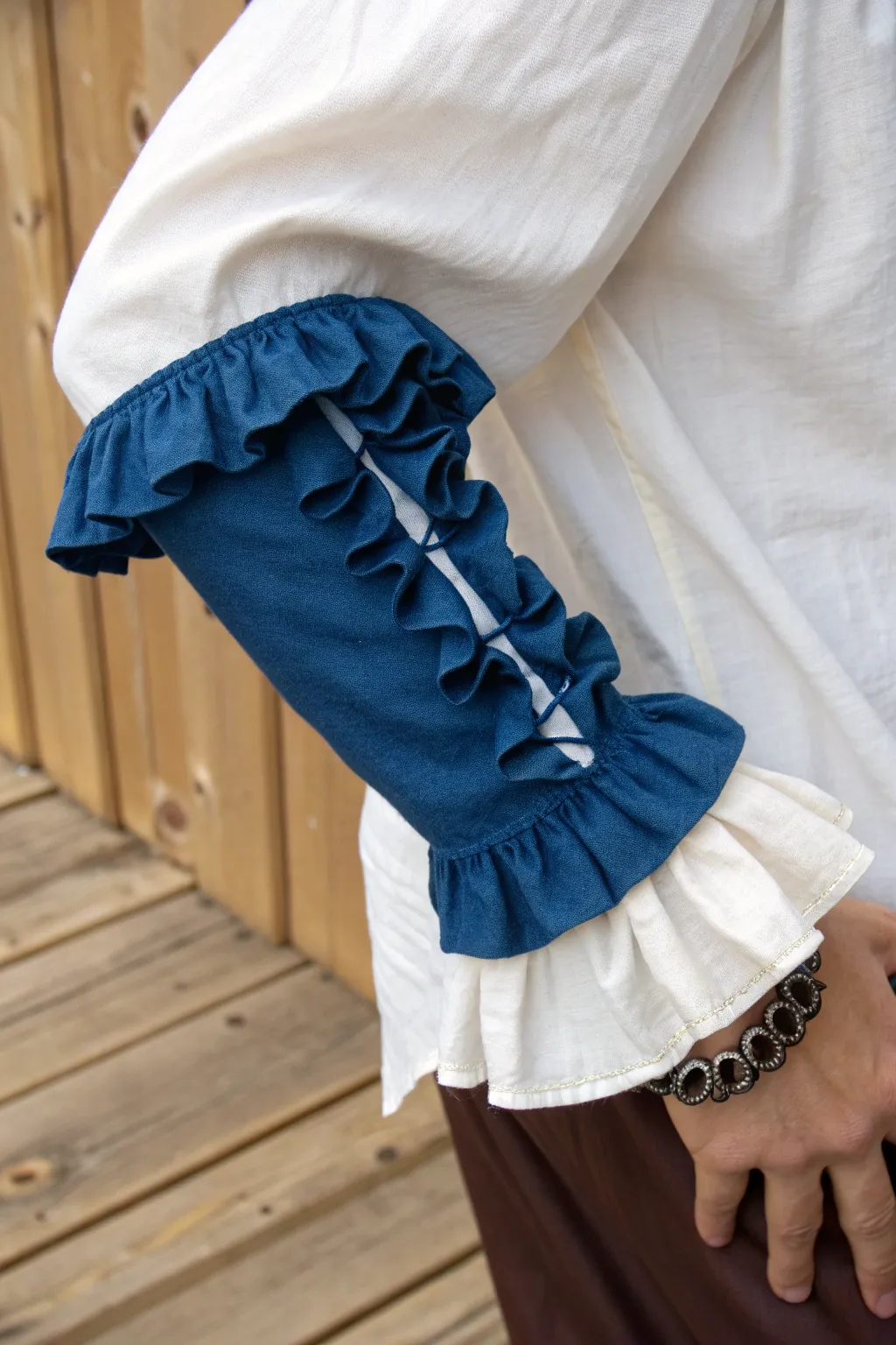 Add a touch of elegance to your DIY pirate costume with fabulous frills that blend minimalist and boho styles.