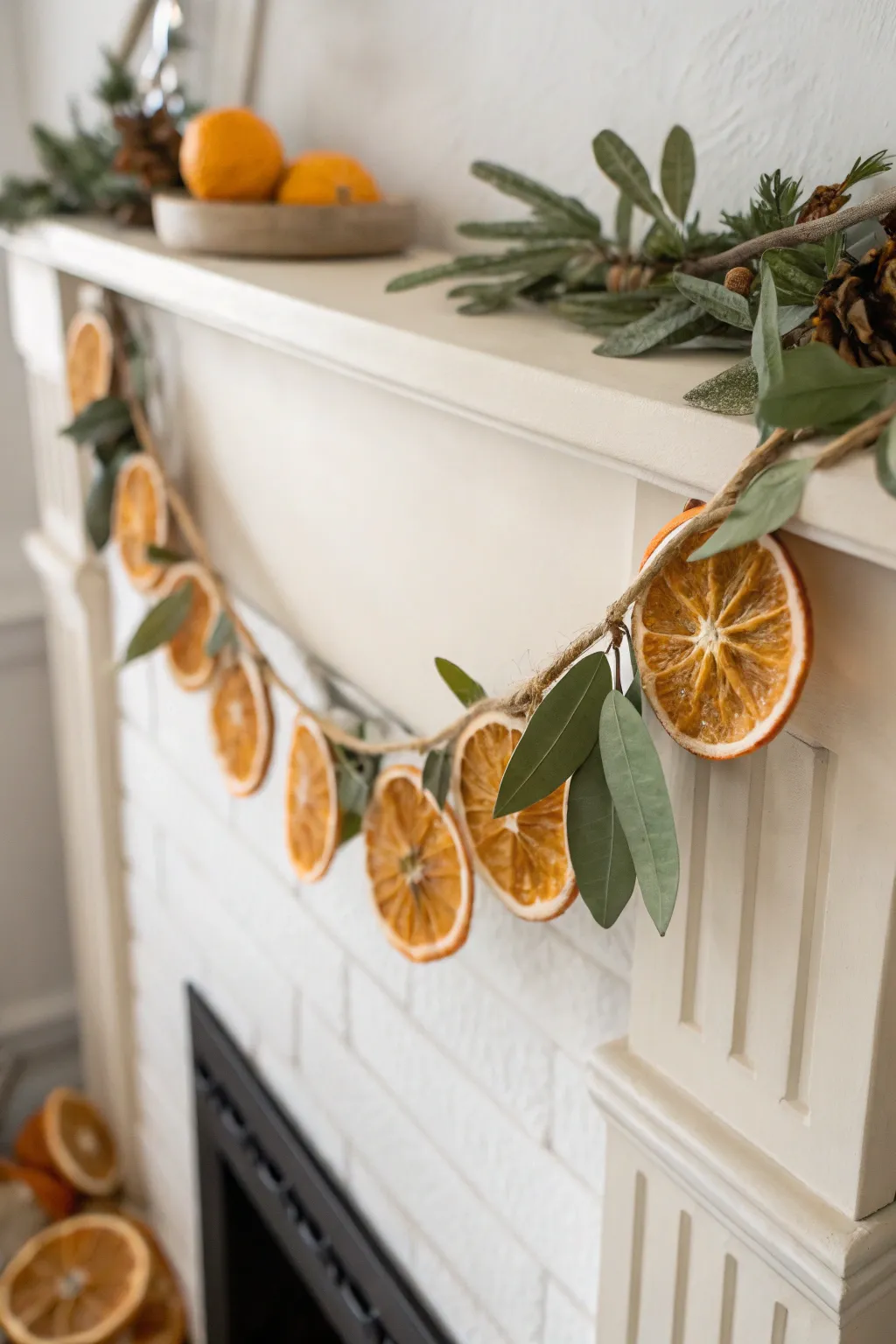 Embrace the cozy elegance of fall with a handcrafted dried orange and bay leaf garland.