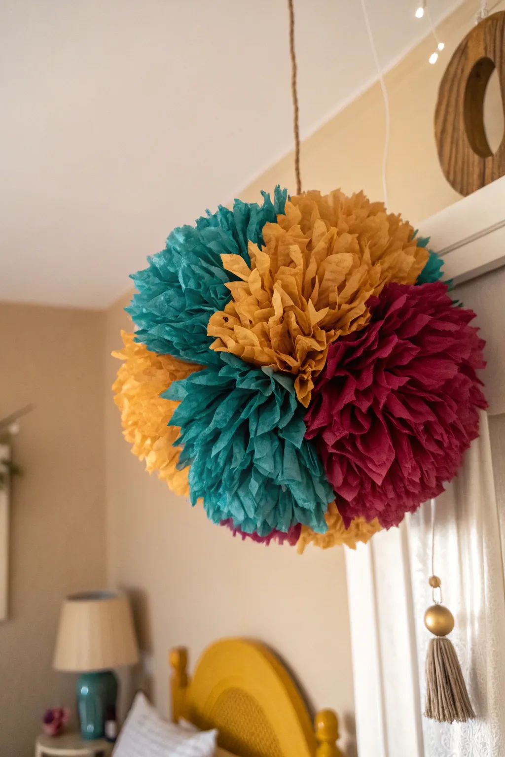 Transforming the ordinary into extraordinary: A vibrant pom-pom made from reused plastic bags, adding a splash of joy to any minimalist decor.