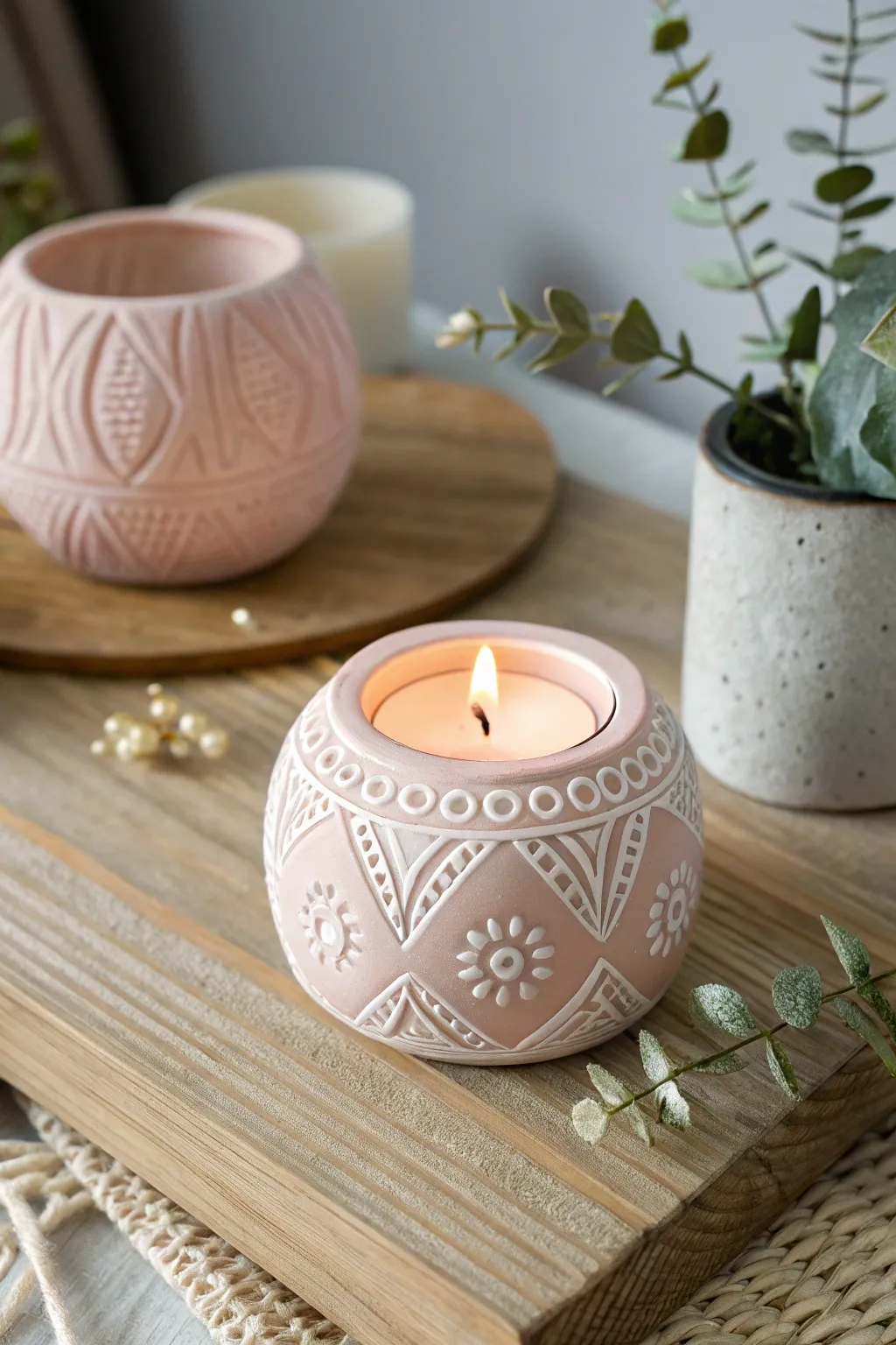 Illuminate your space with handcrafted elegance: a minimalist polymer clay tea light holder that offers warmth and charm.