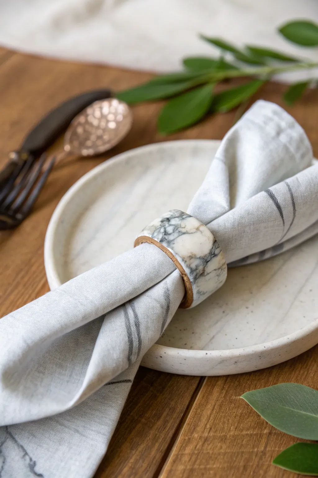 Elevate your table setting with this stunning stone-look napkin ring, where minimalist elegance meets handcrafted charm.
