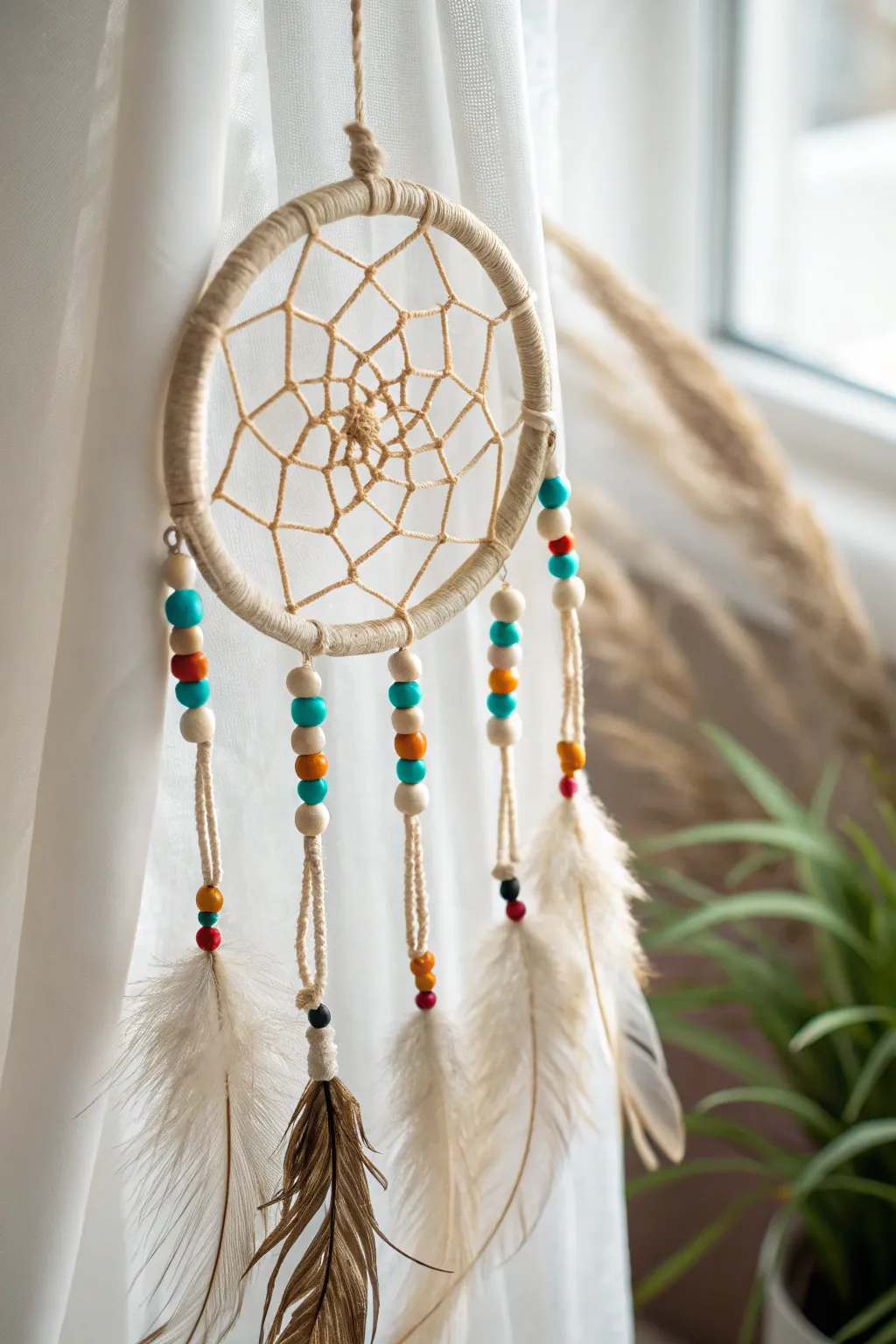 Catch dreams in style with this vibrant yet minimalist pony bead dreamcatcher.