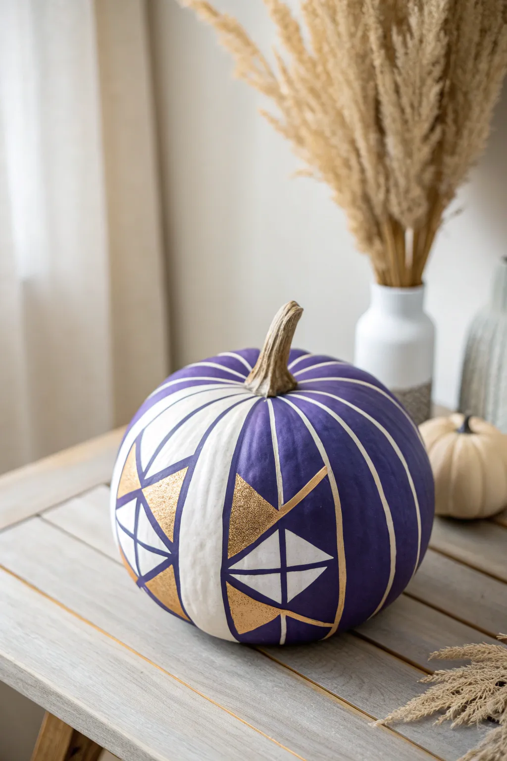 Transform your pumpkin into a chic work of art with bold geometric patterns this autumn!