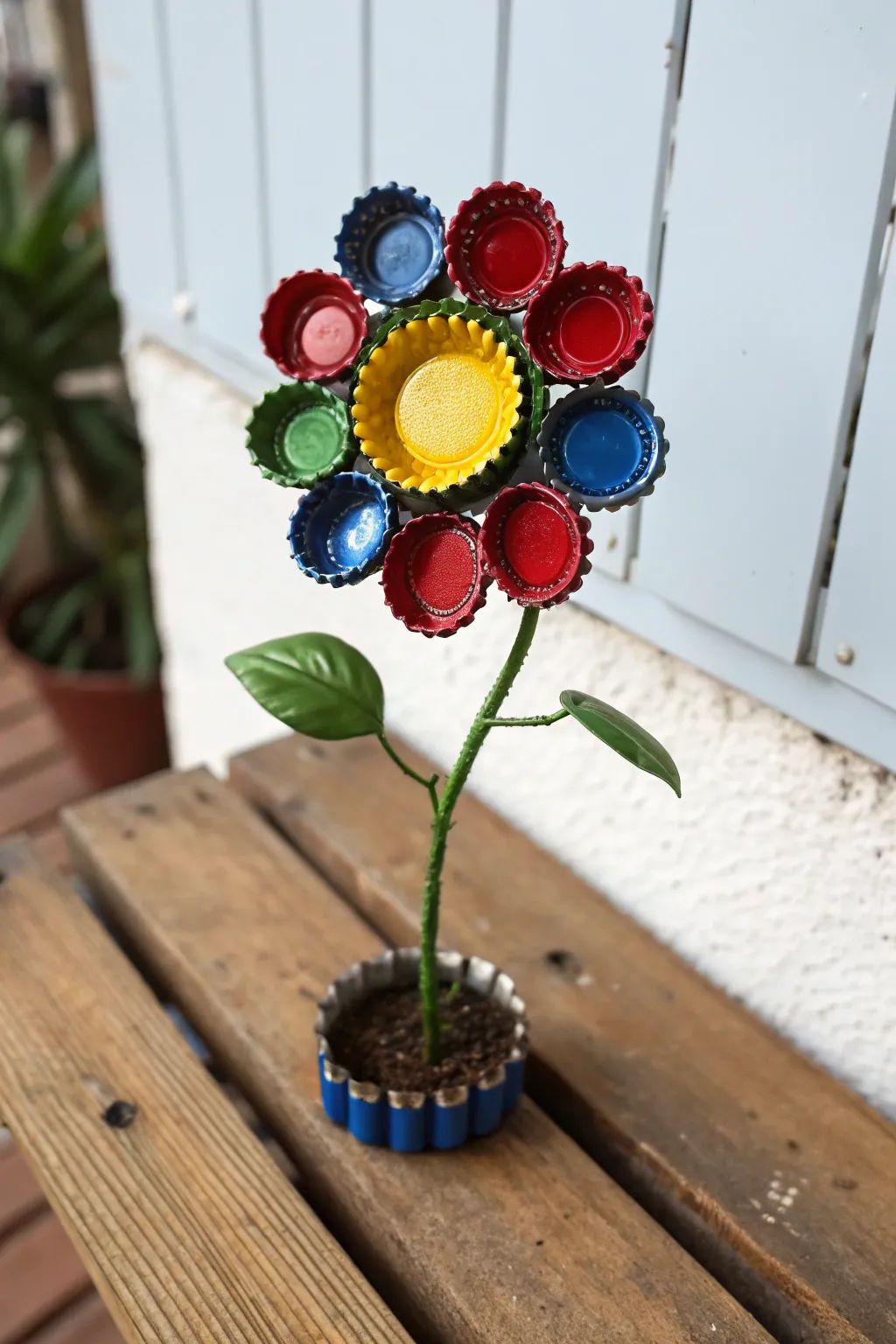 Transform your garden with this stunning bottle cap flower—where creativity meets sustainability!