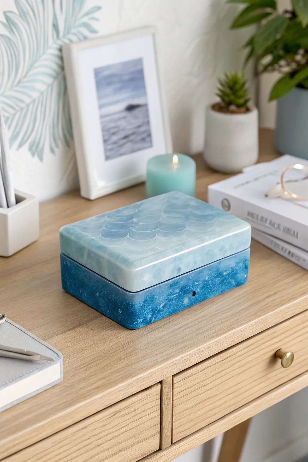 Embrace tranquility with this enchanting blue monochrome resin trinket box, perfect for a serene and organized workspace.